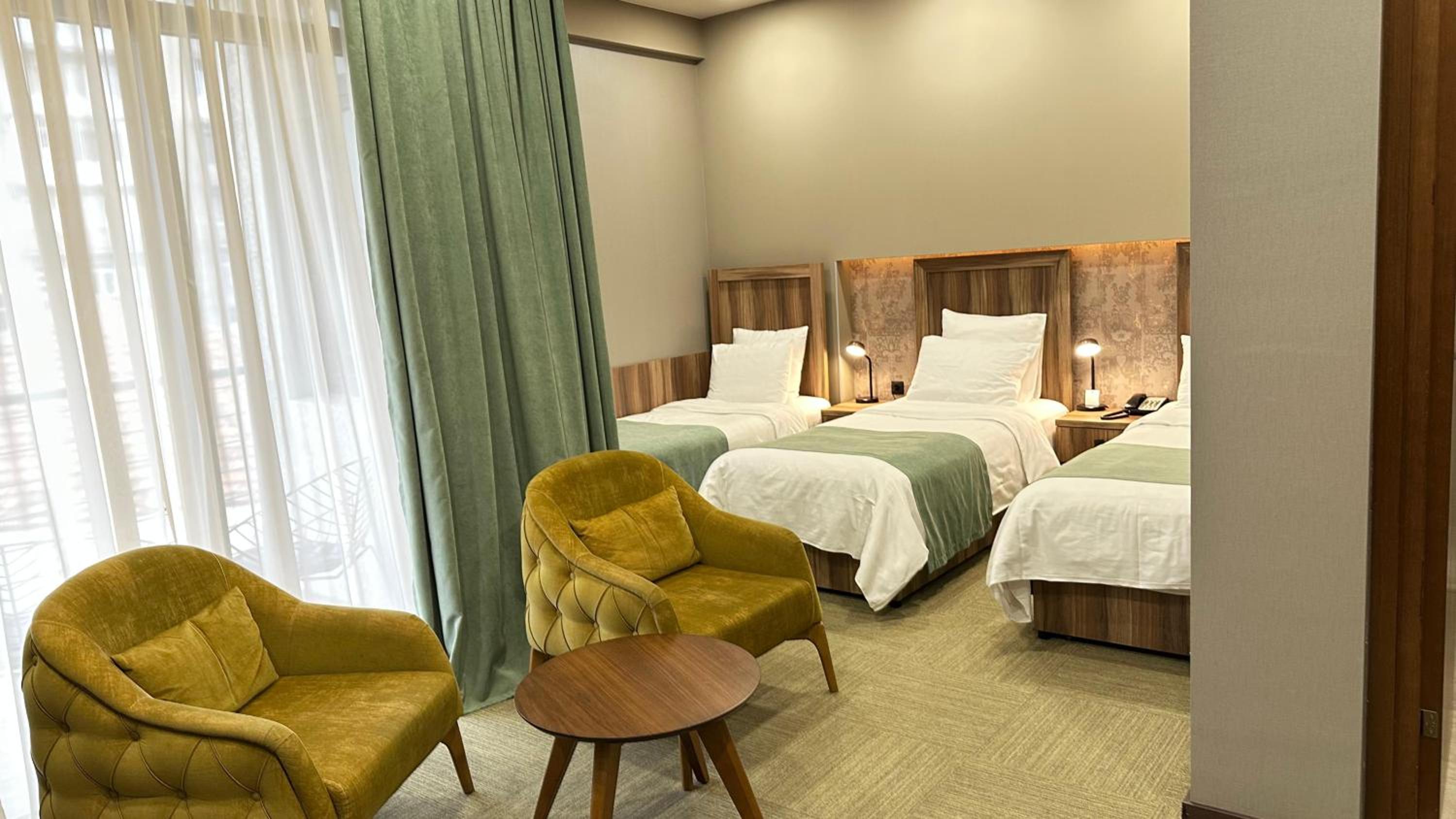 Superior Triple Room with Balcony and Garden View - Non-Smoking photo 3