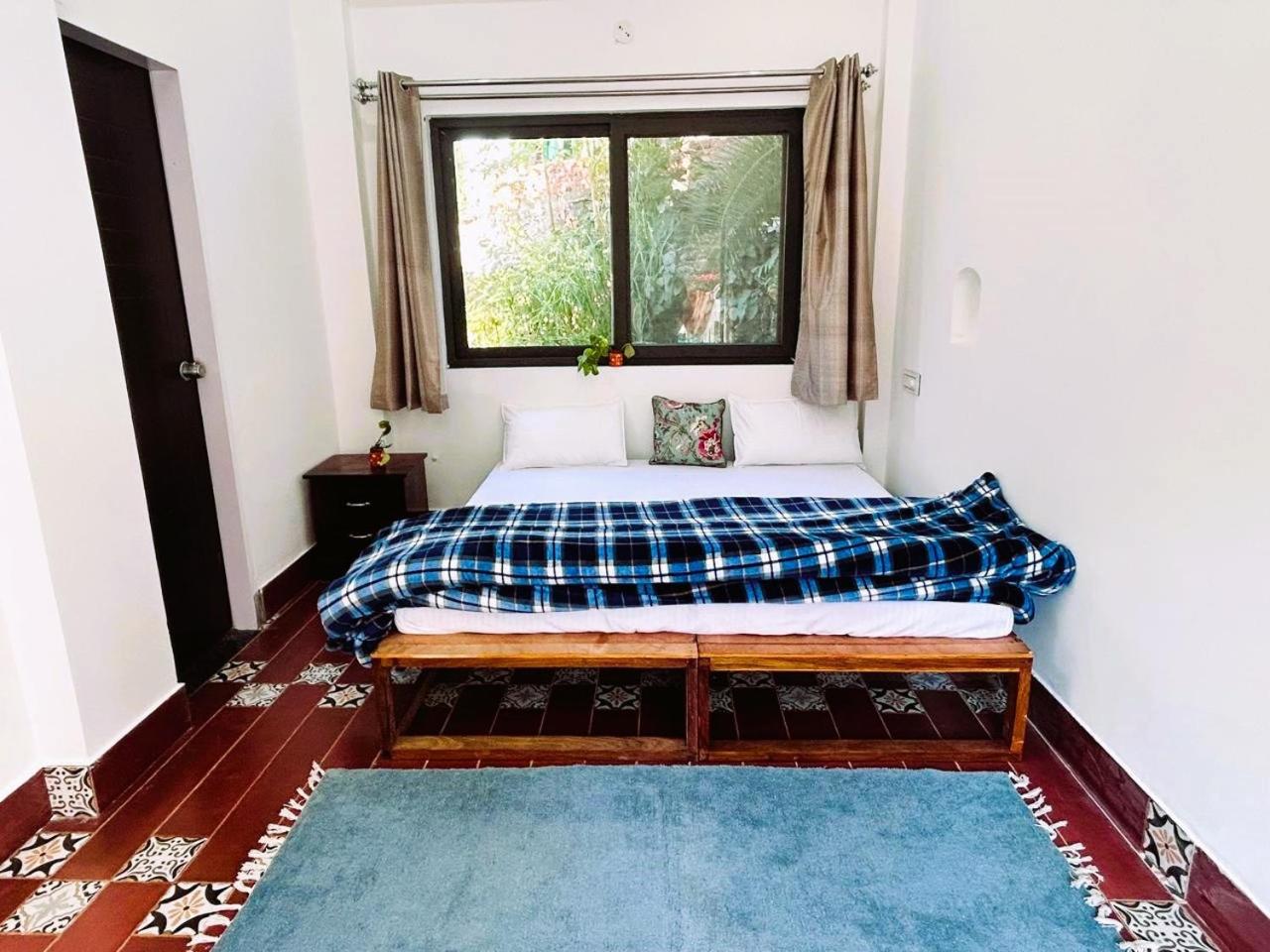 Economy Quadruple Room with Shared Bathroom