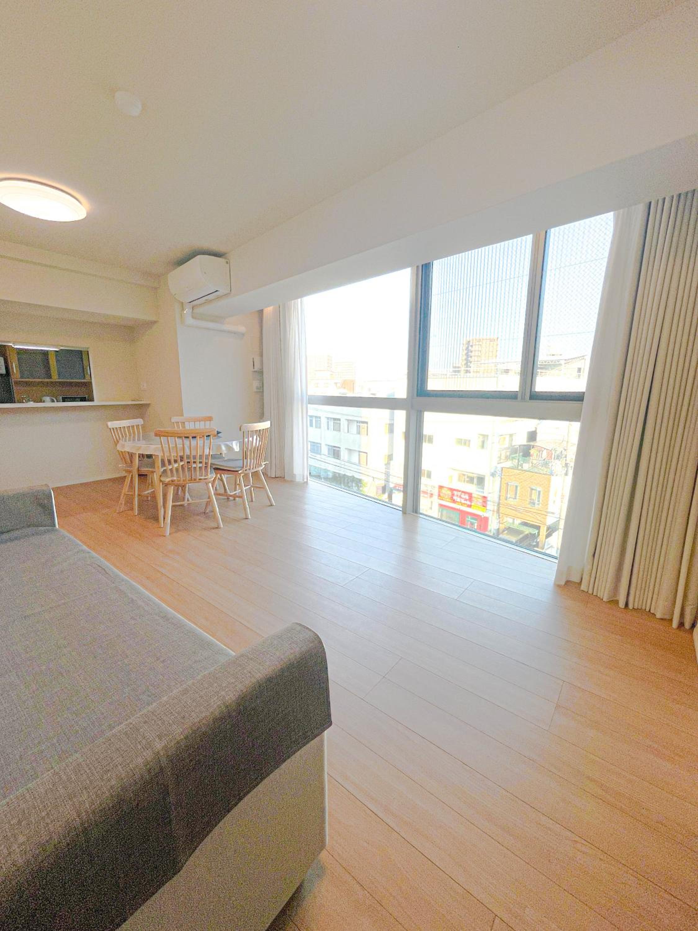 Three-Bedroom Apartment with Balcony