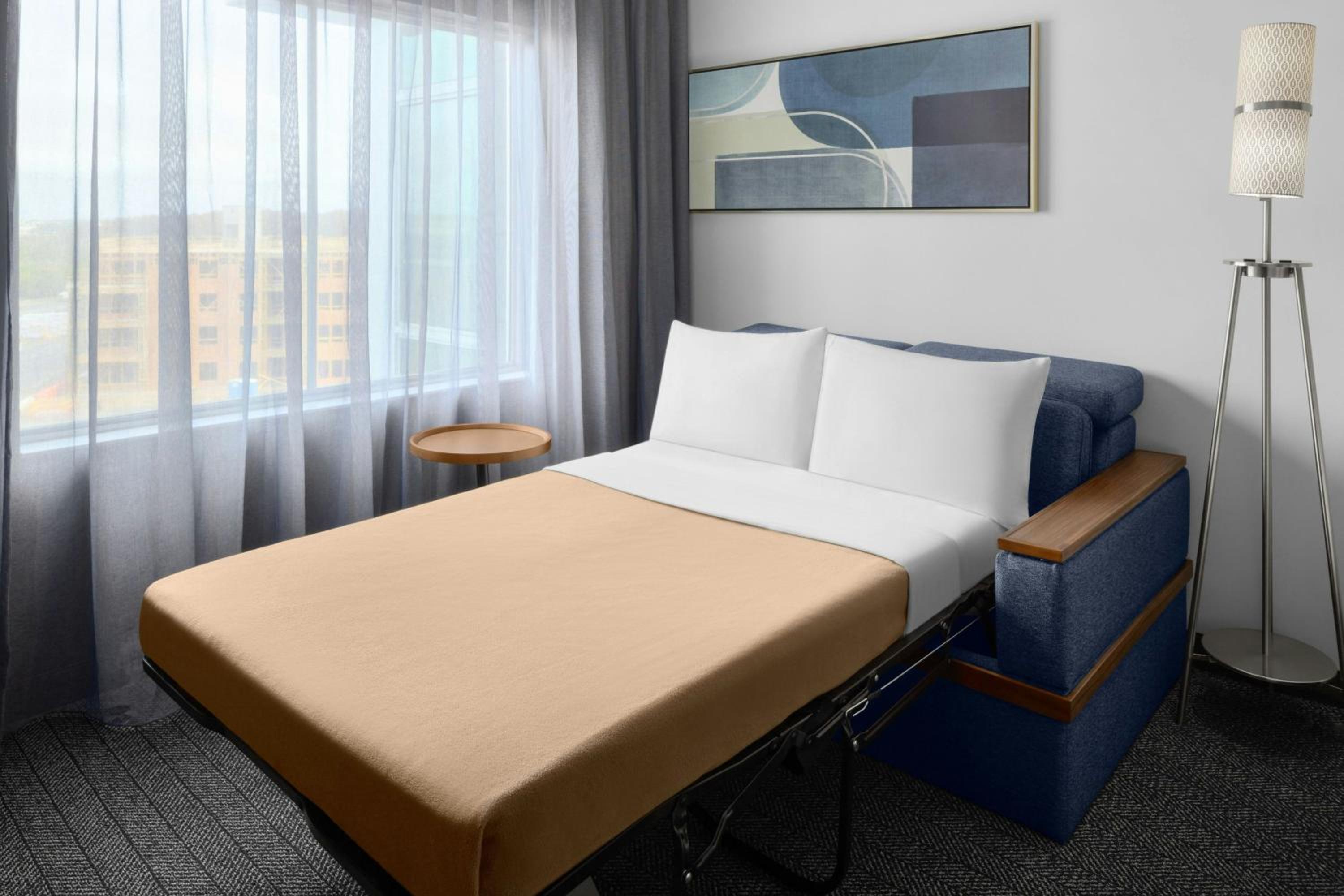 Queen Suite with Two Queen Beds and Sofa Bed