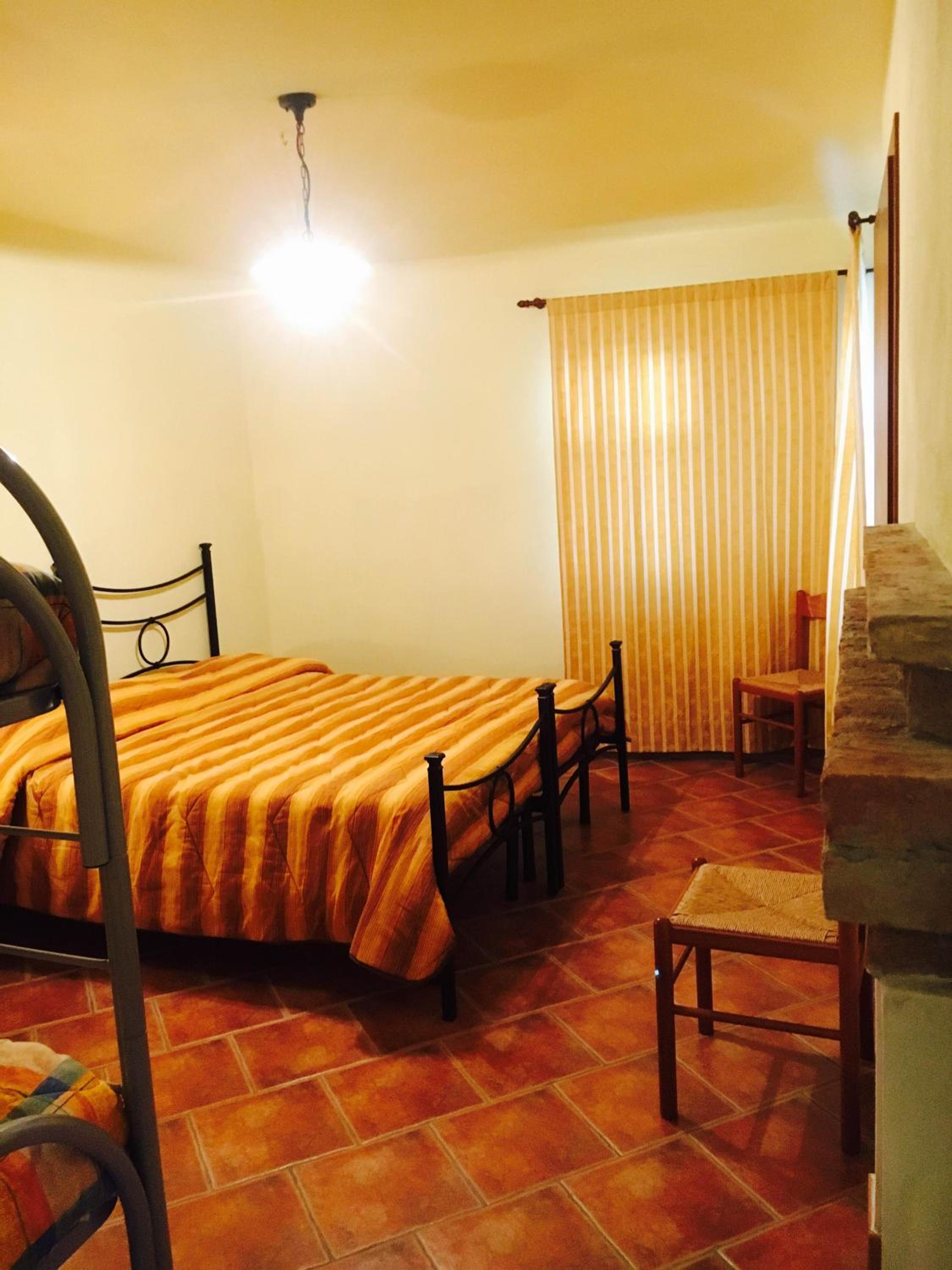 Quadruple Room with Kitchenette