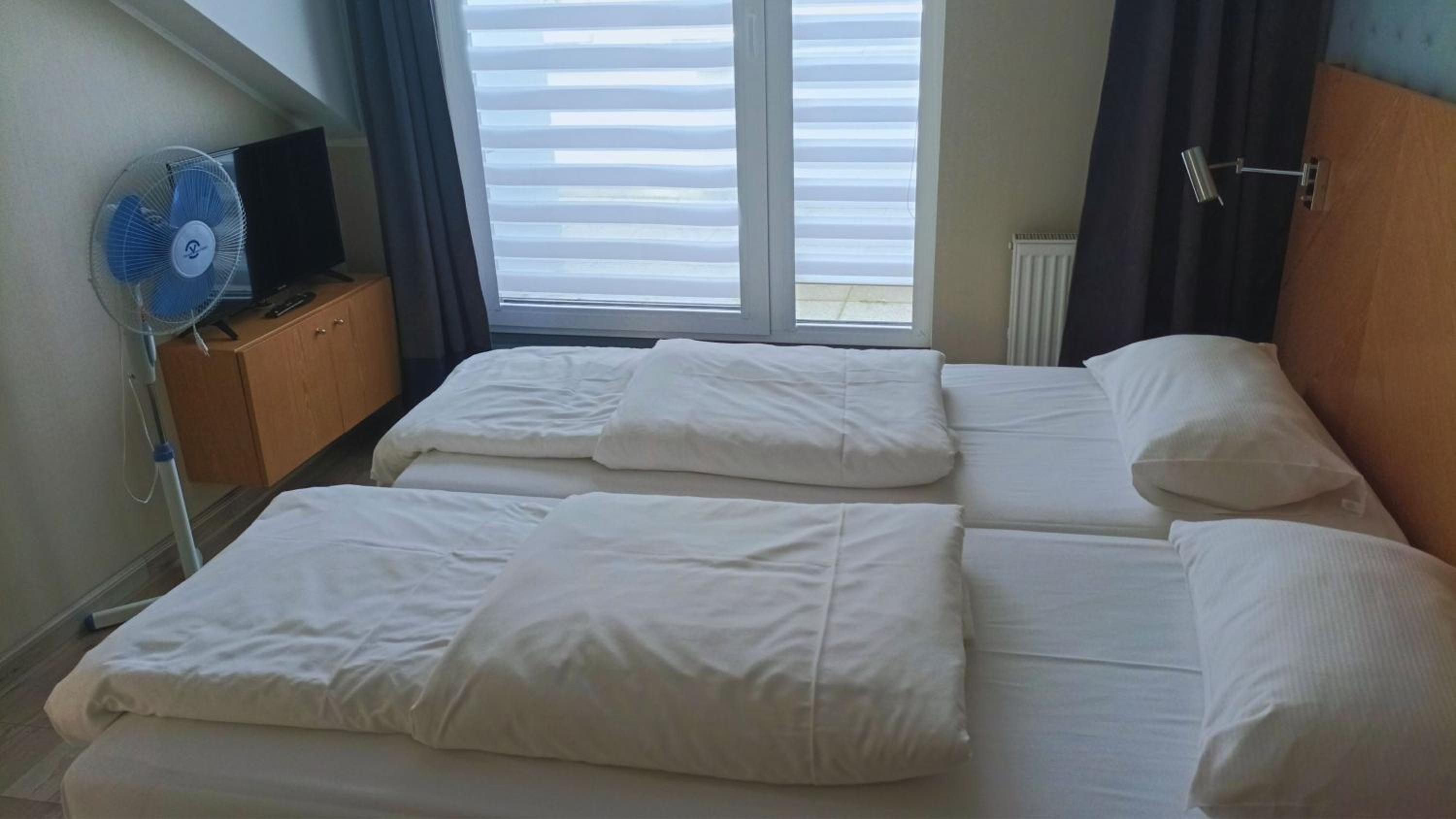 Two-Bedroom Apartment with Balcony - right next to the hotel