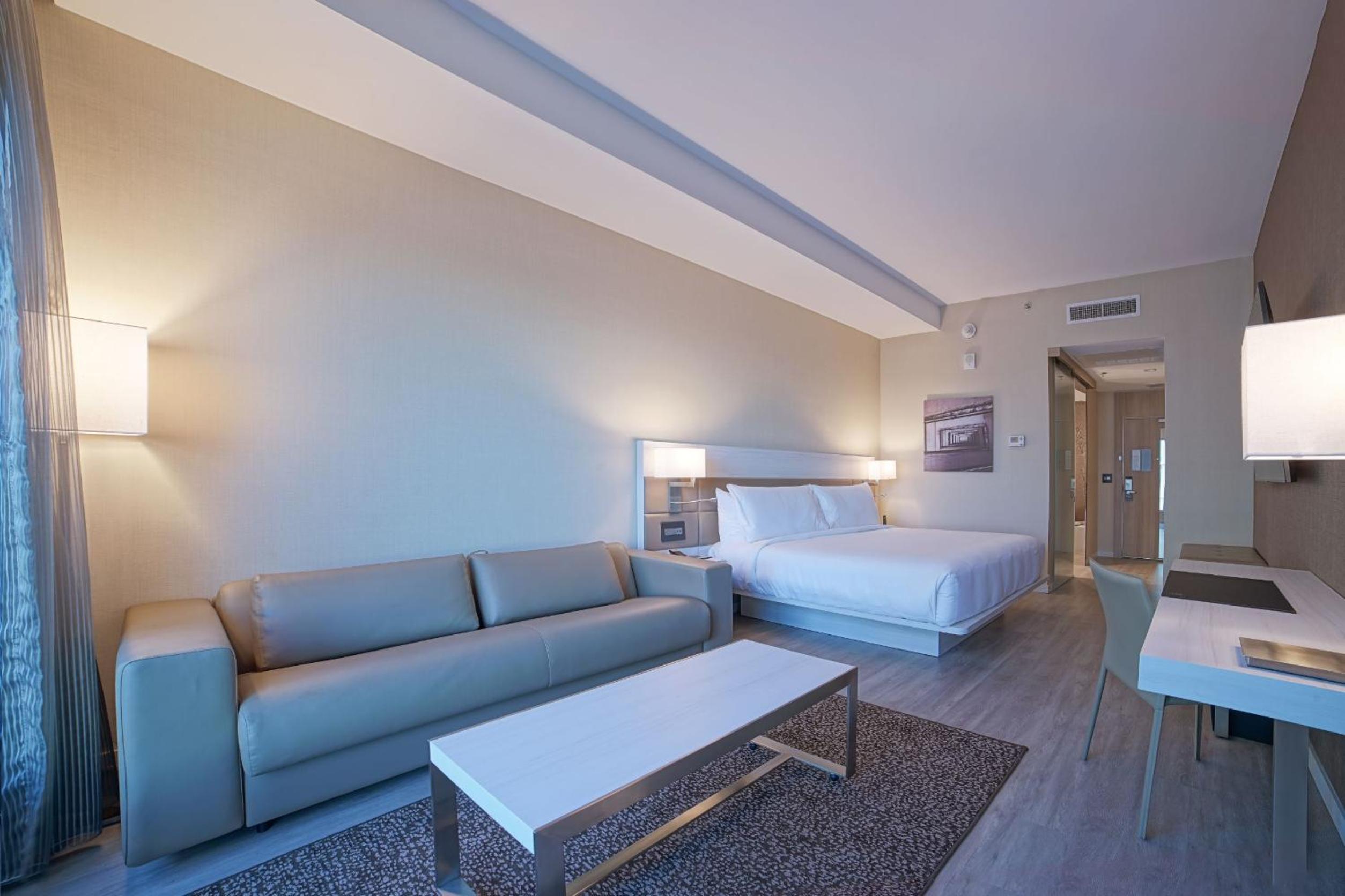 Standard Guest Room with  1 King Bed, Sofa bed - Photo 1