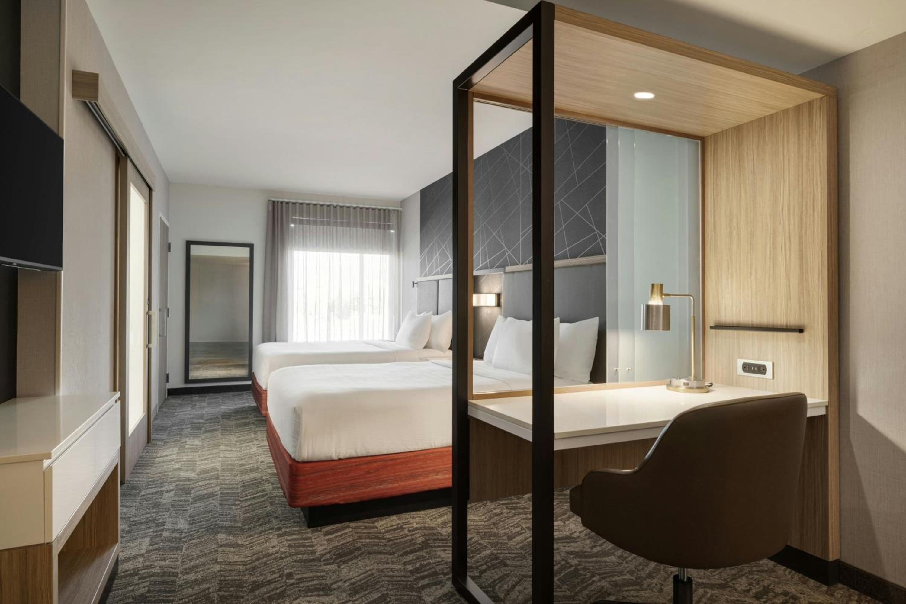 Queen Suite with Two Queen Beds and Sofa Bed - Photo 1