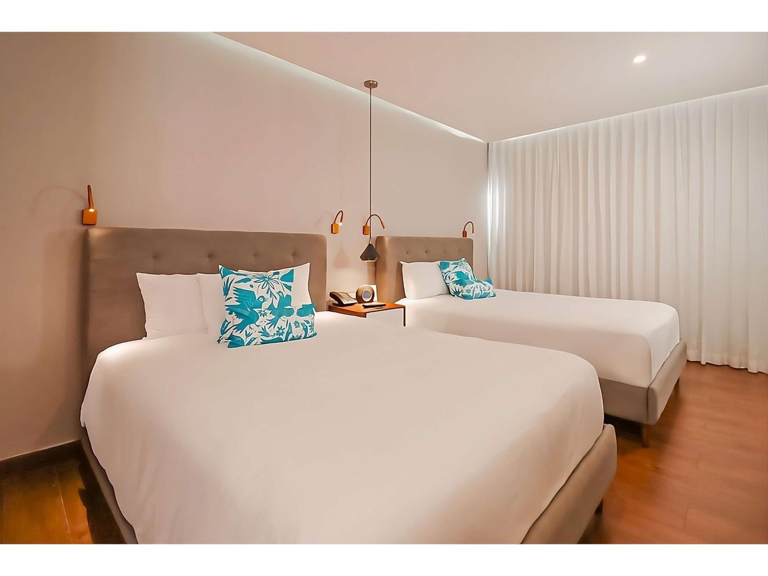 Deluxe Room with Tow Double Beds - Courtyard View photo 2