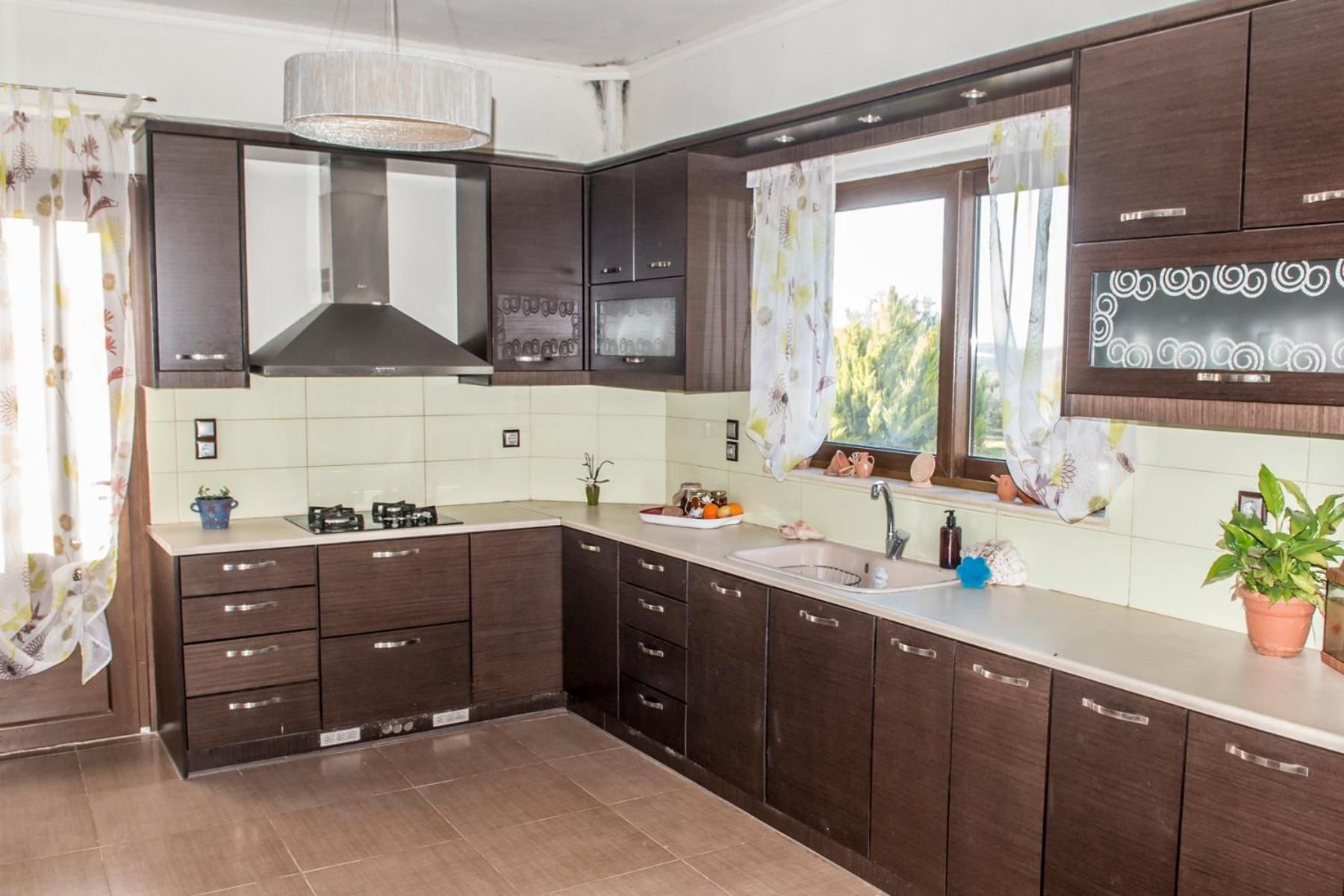 Three-Bedroom House - Photo 15