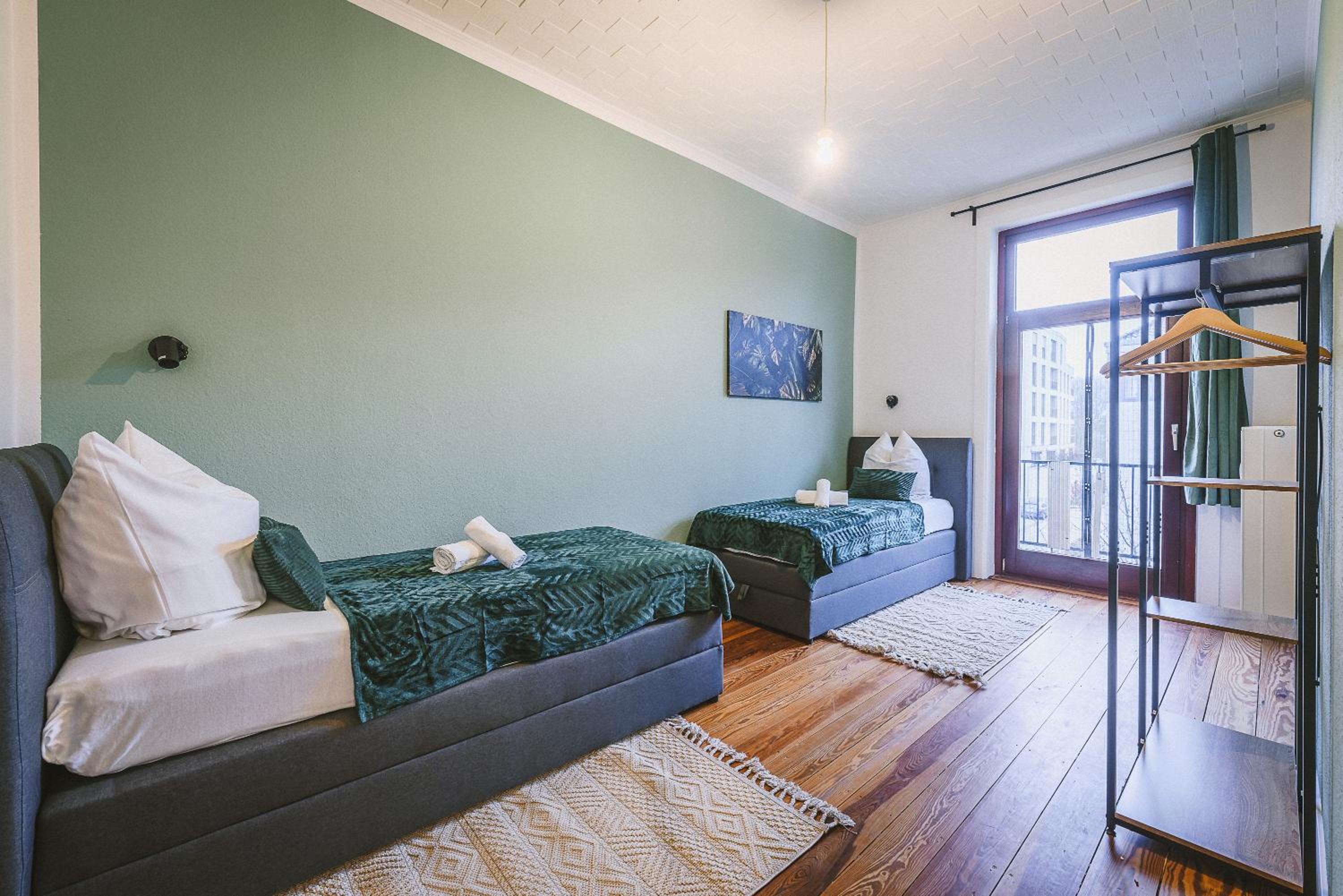 Three-Bedroom Apartment with Balcony photo 2