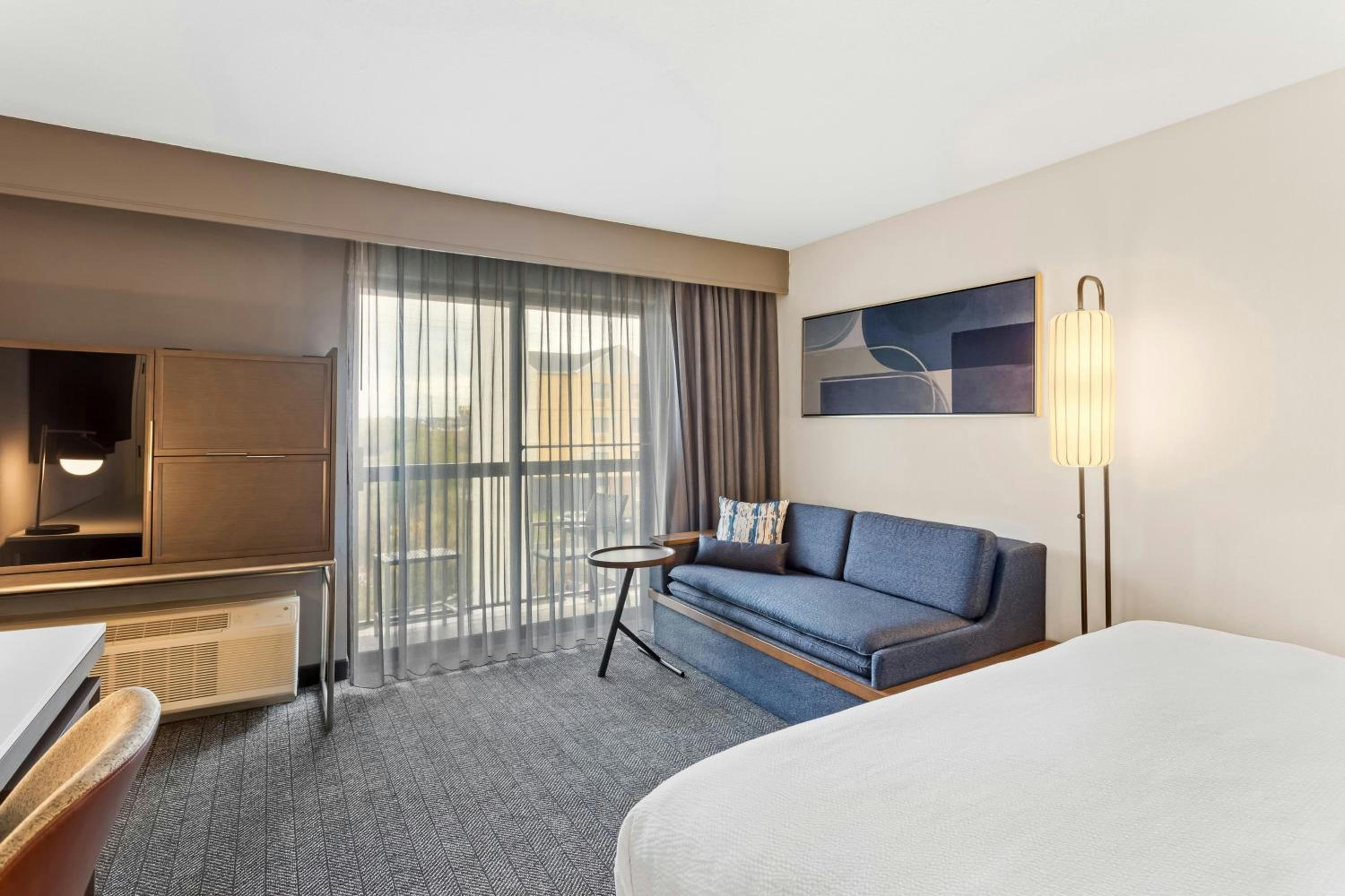 King Room with Balcony and Sofa Bed