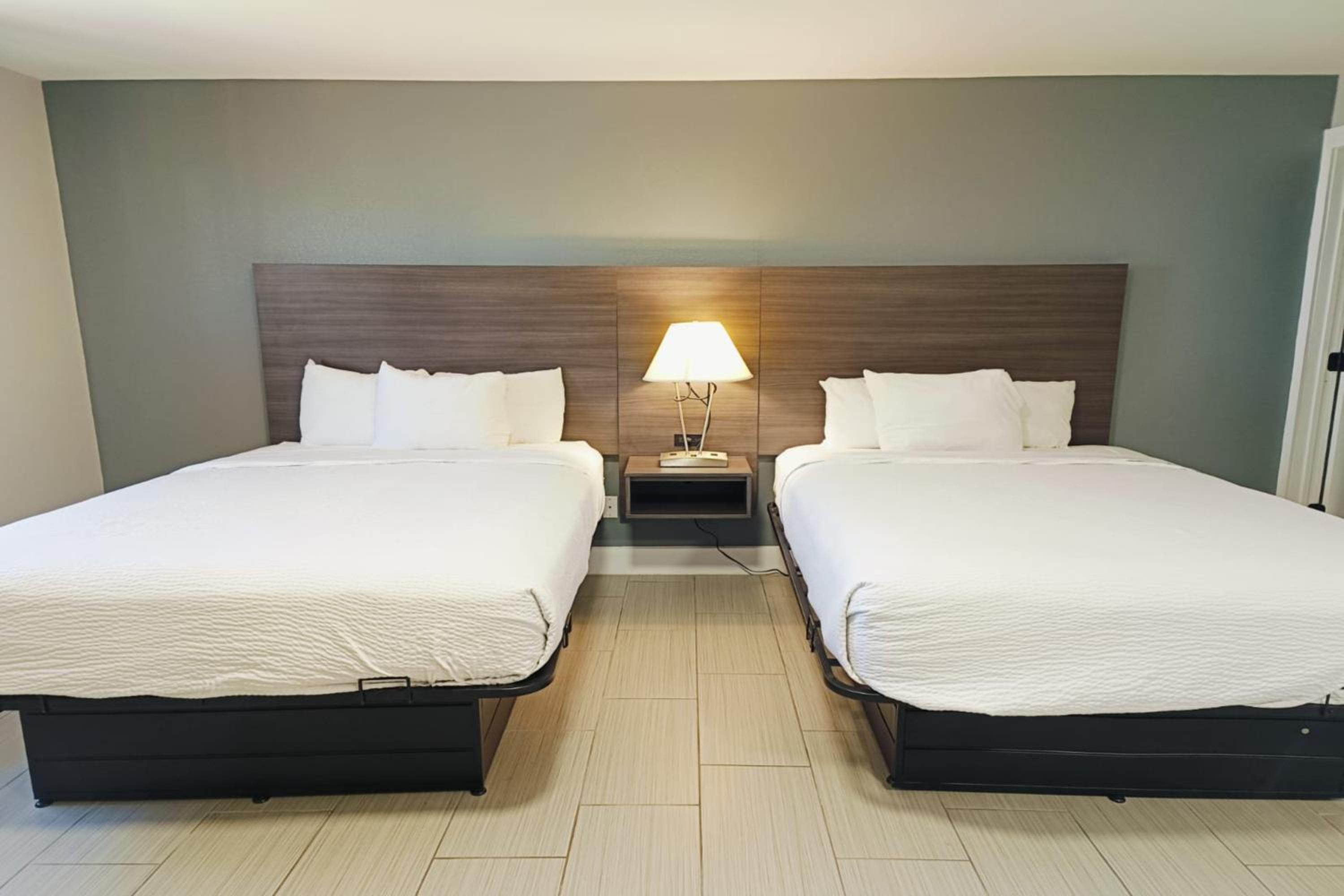 Queen Room with Two Queen Beds - Photo 1