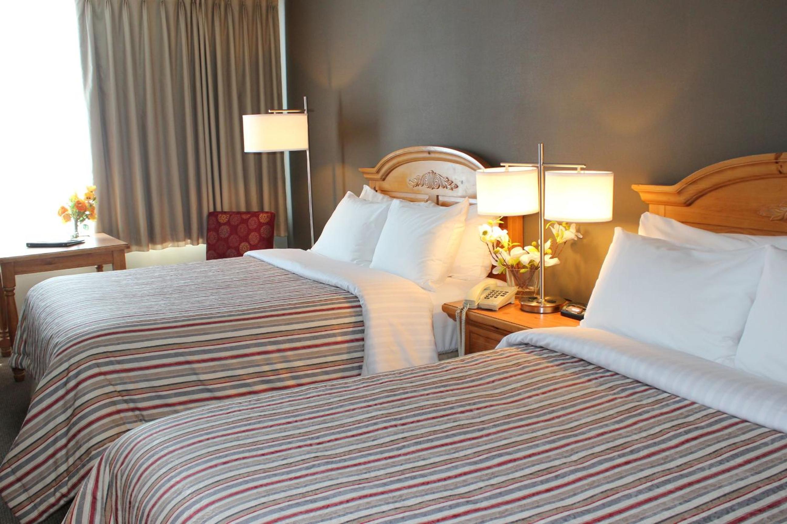 Room with Two Double Beds and Lake View photo 1