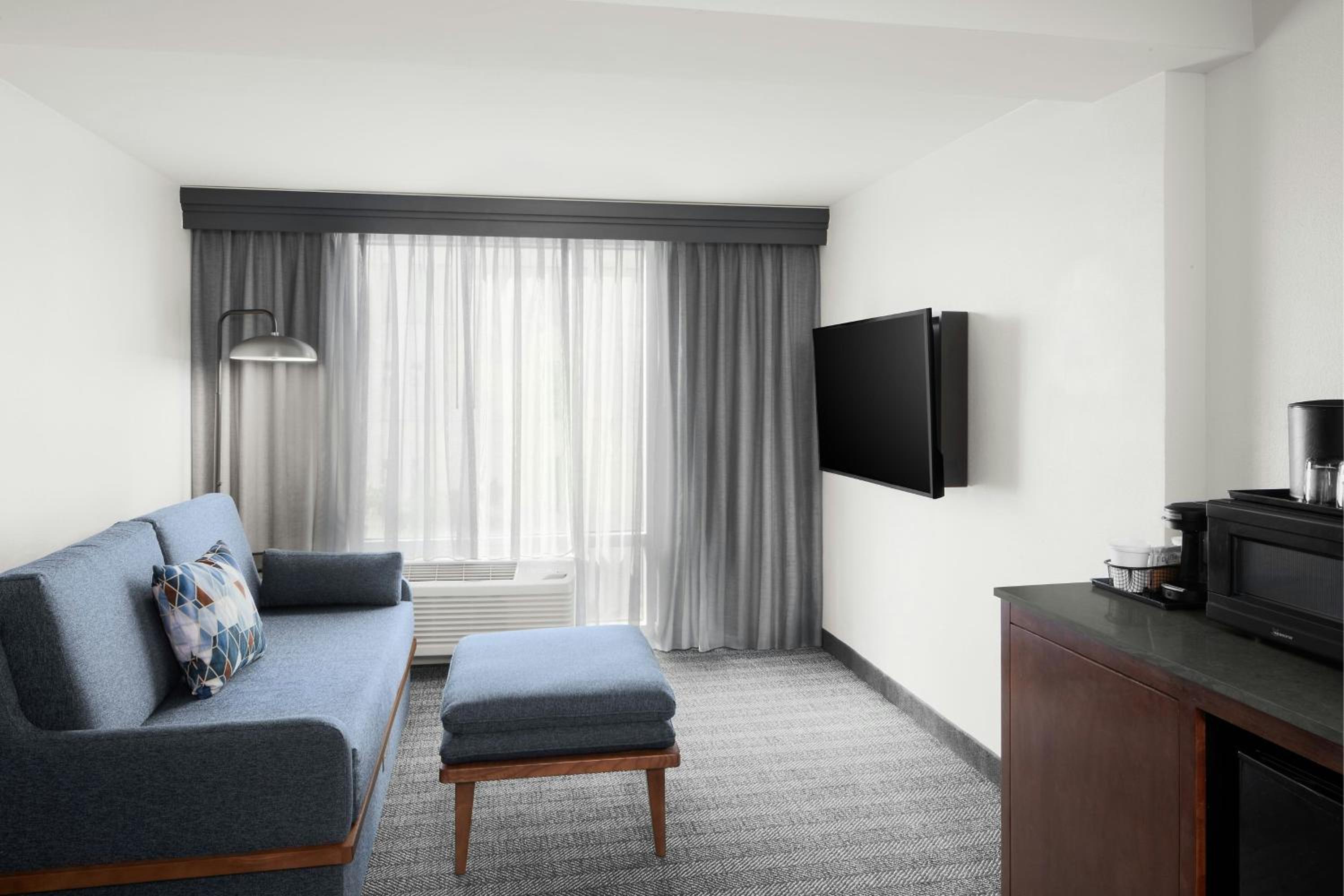 One-Bedroom King Suite with Roll-In Shower and Sofa Bed - Mobility Access/Hearing Accessible photo 1