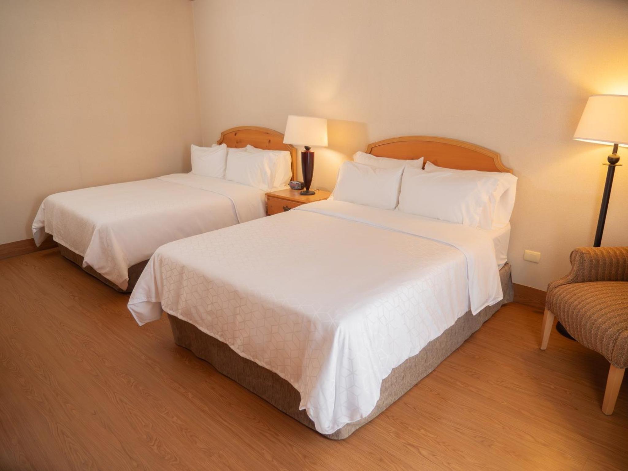 Standard Room with Two Queen Beds - Photo 1