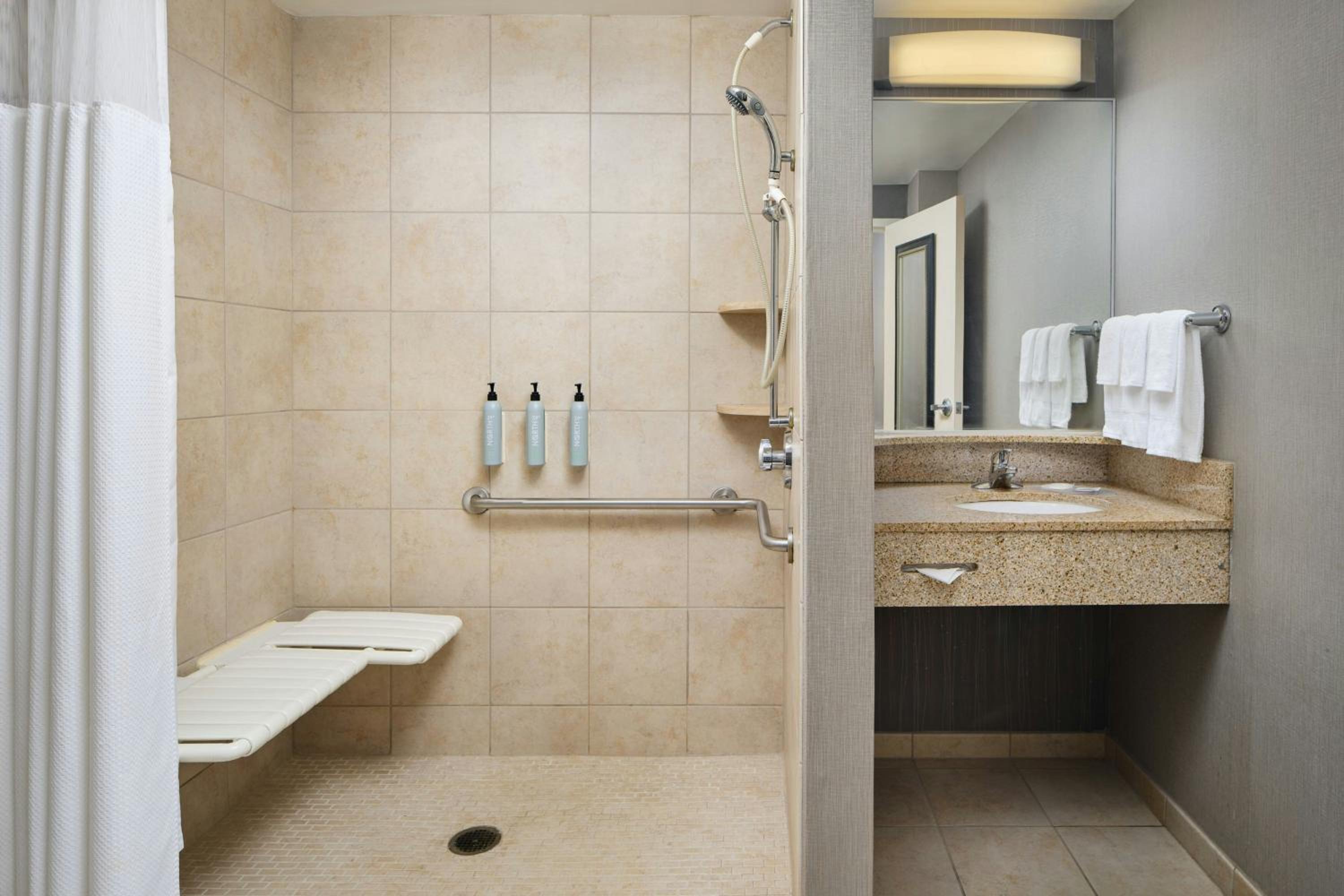 King Room with Sofa Bed and Roll-in Shower - Mobility and Hearing Accessible