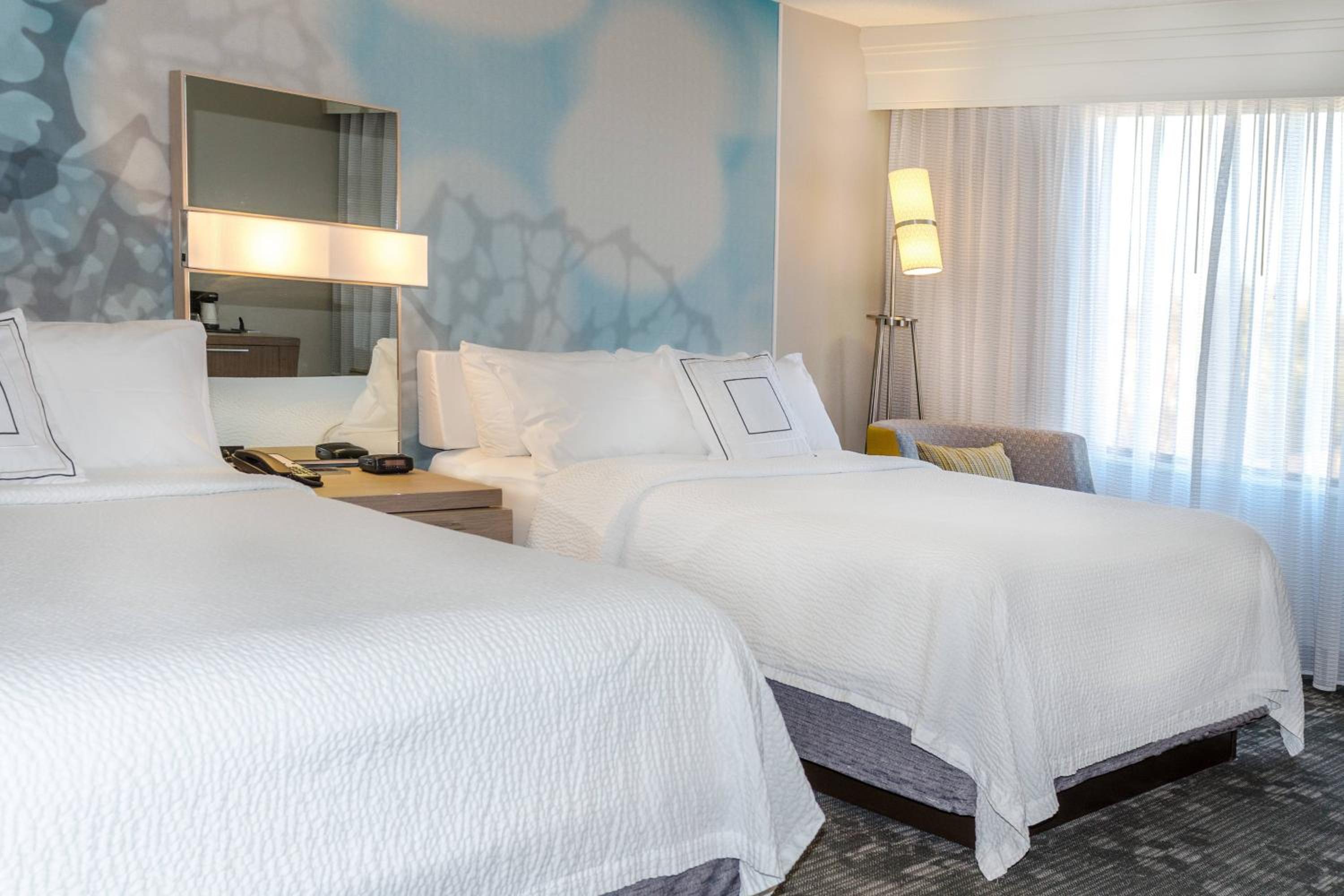 Queen Room with Two Queen Beds and Sofa Bed - Photo 2