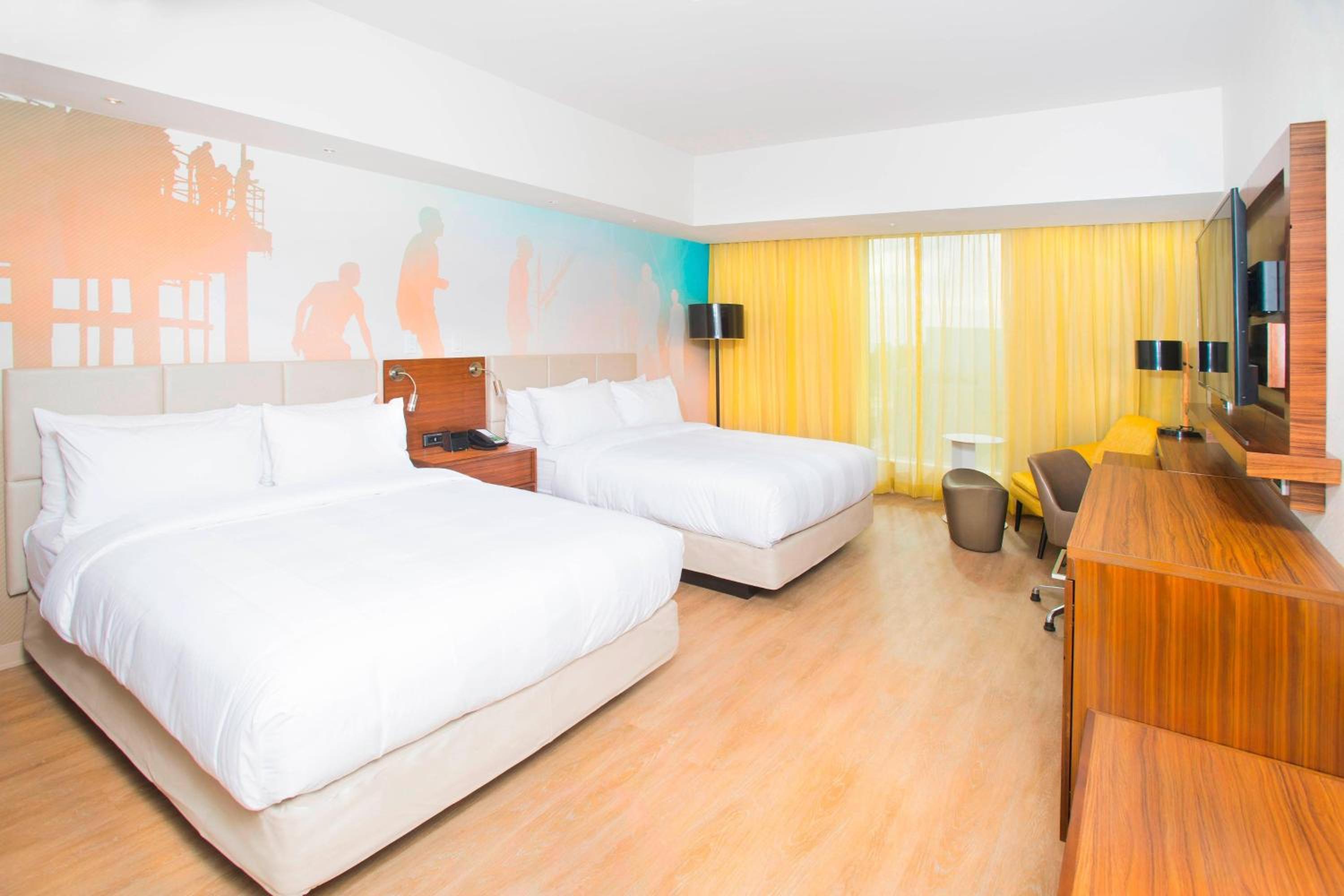 Queen Room with Two Queen Beds and Bathtub - Mobility Access/Hearing Accessible photo 1