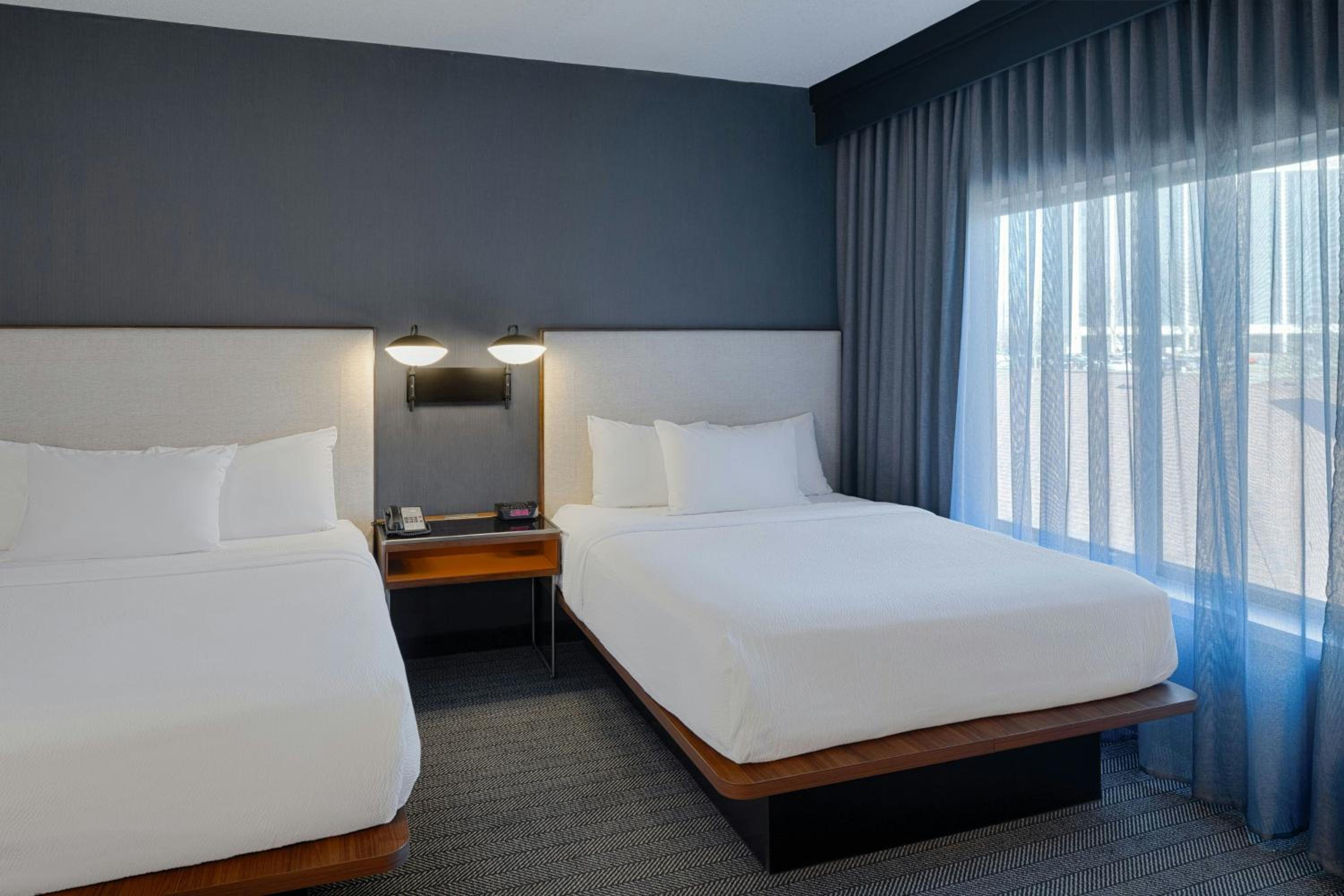 One-Bedroom Queen Suite with Two Queen Beds and Sofa Bed - Photo 1