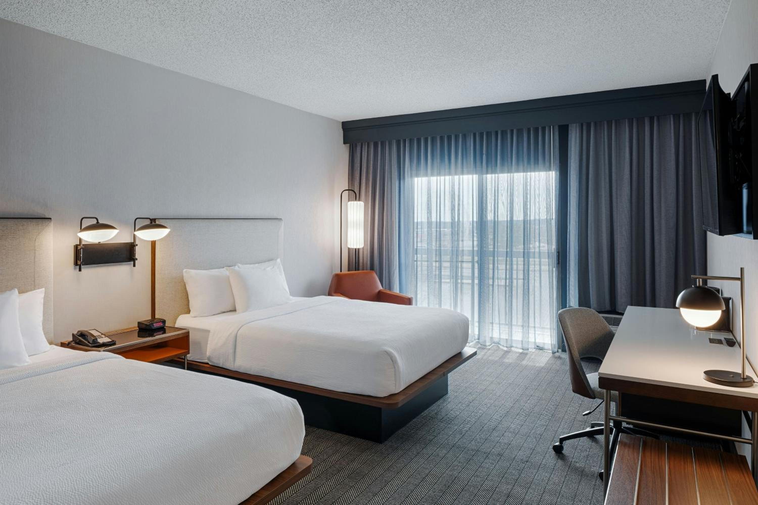 Queen Room with Two Queen Beds - Hearing Accessible - Photo 1