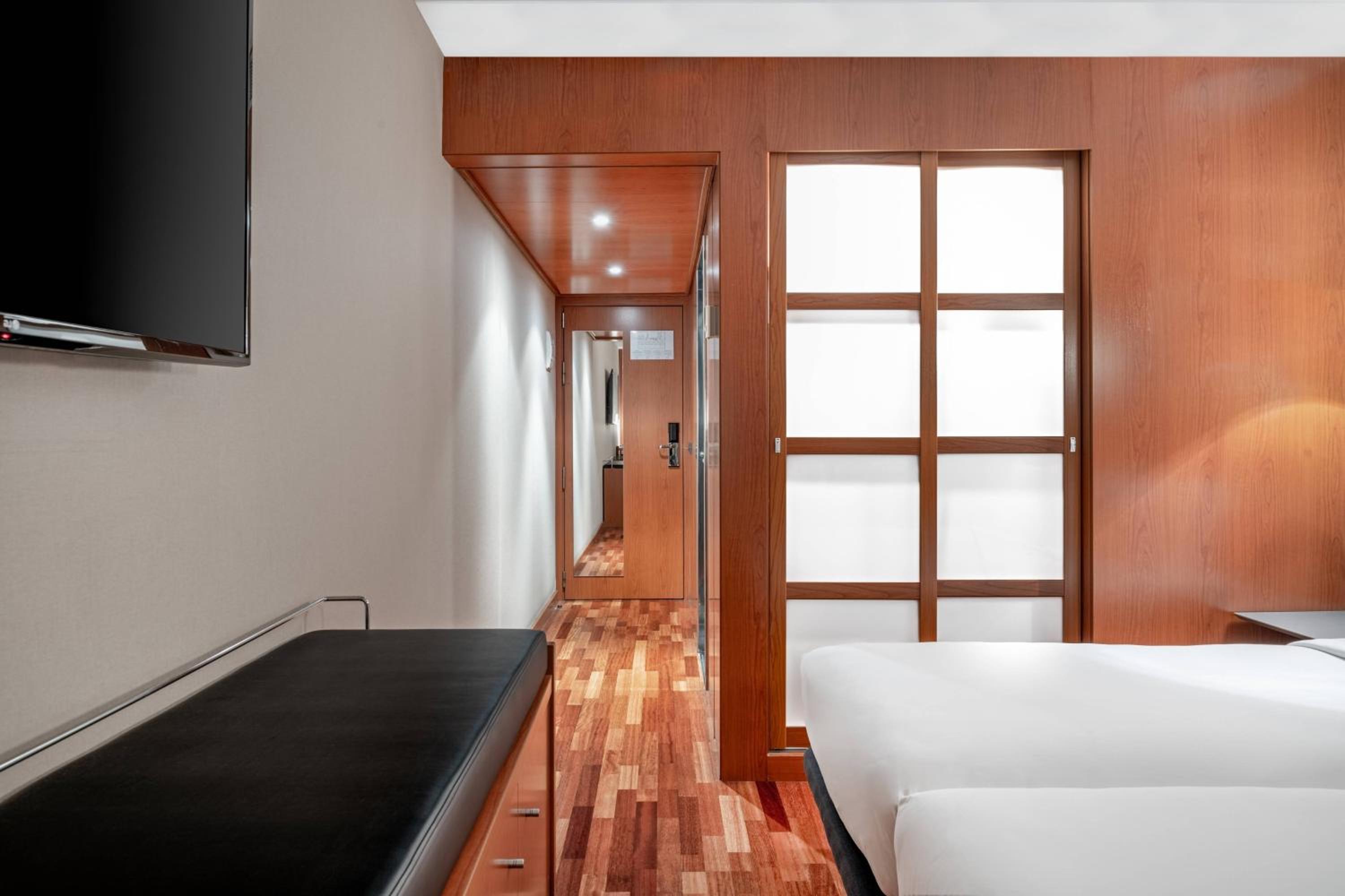 Standard Triple Twin Room with Two Twin Beds and Sofa Bed
