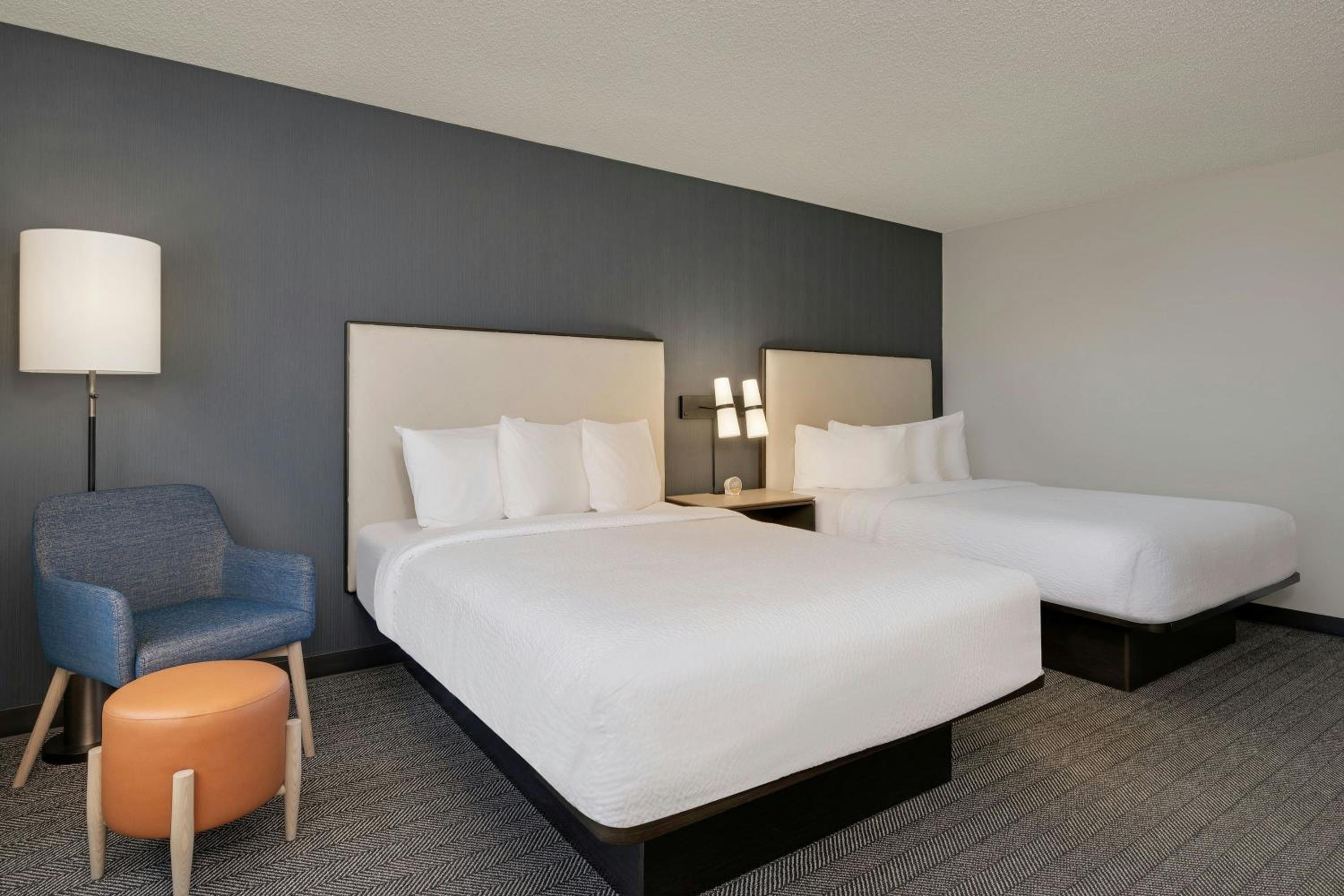 Queen Room with Two Queen Beds - Photo 1