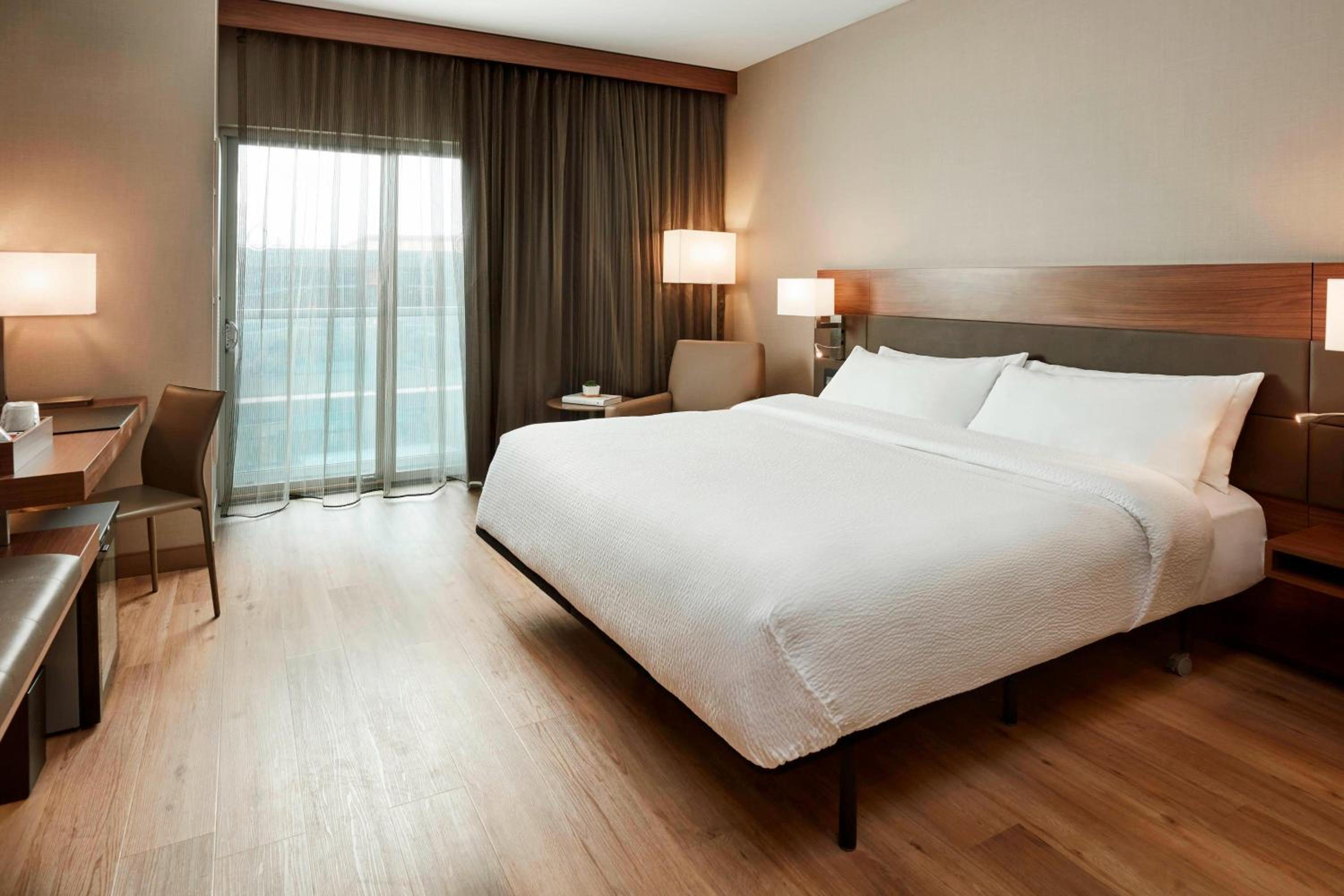 King Room with River View, Balcony and Sofa Bed