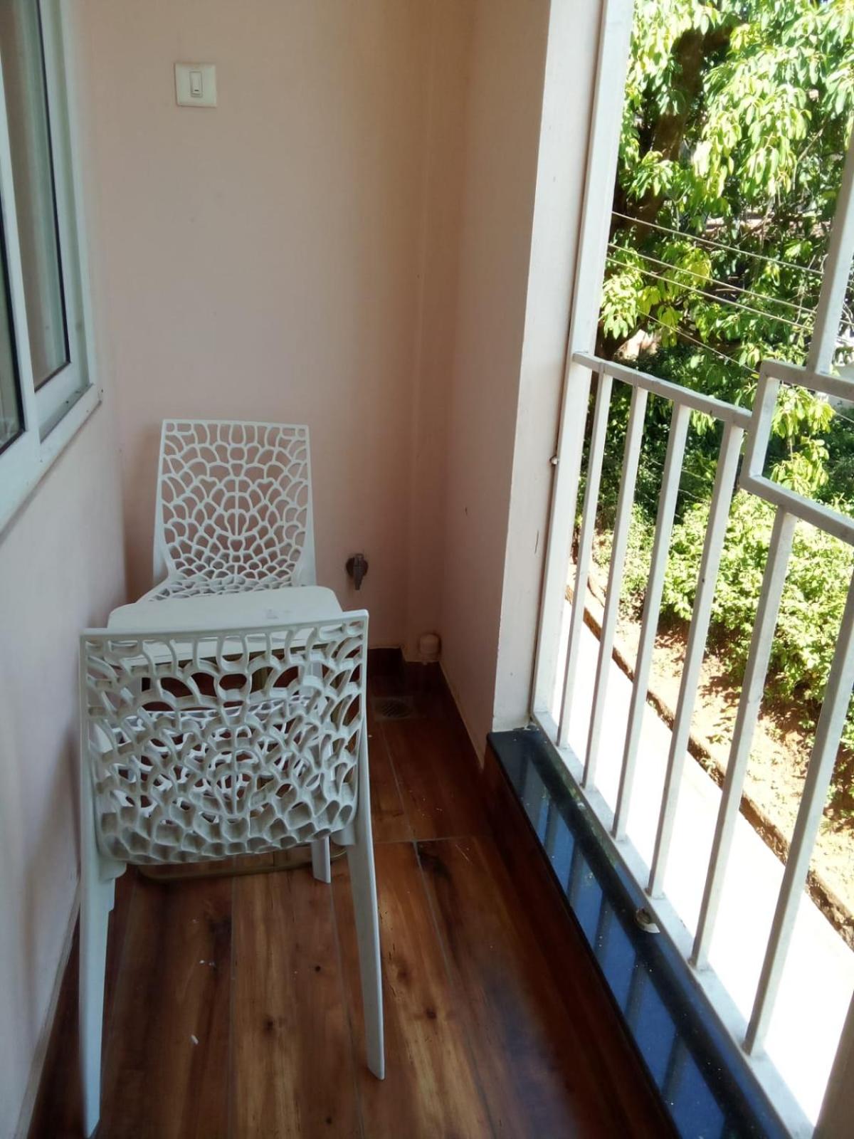 One-Bedroom Apartment with Balcony and City View photo 1