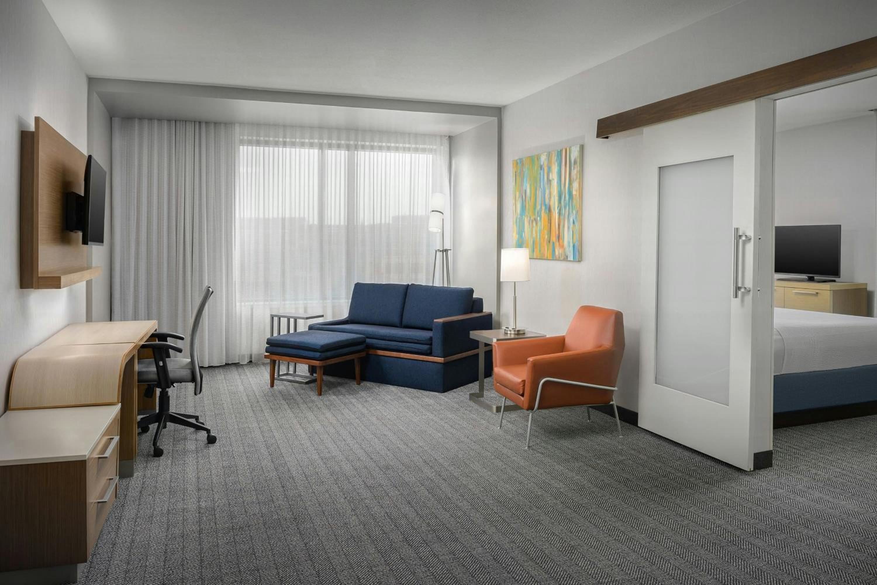 One-Bedroom Queen Suite with Two Queen Beds, Roll-In Shower and Sofa Bed - Mobility Access/Hearing Accessible photo 1