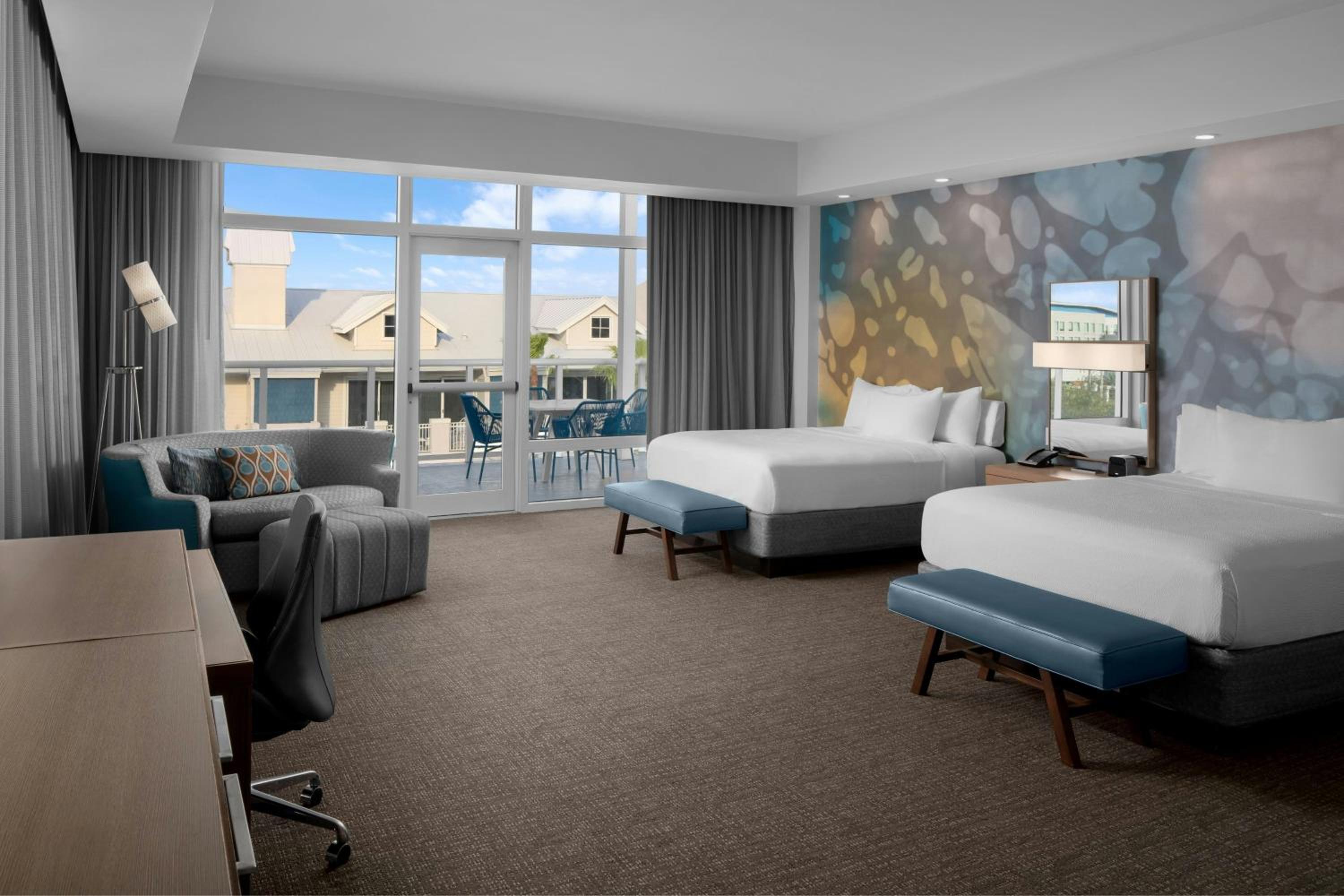 Queen Suite with Two Queen Beds, Balcony and Sofa Bed - Photo 1