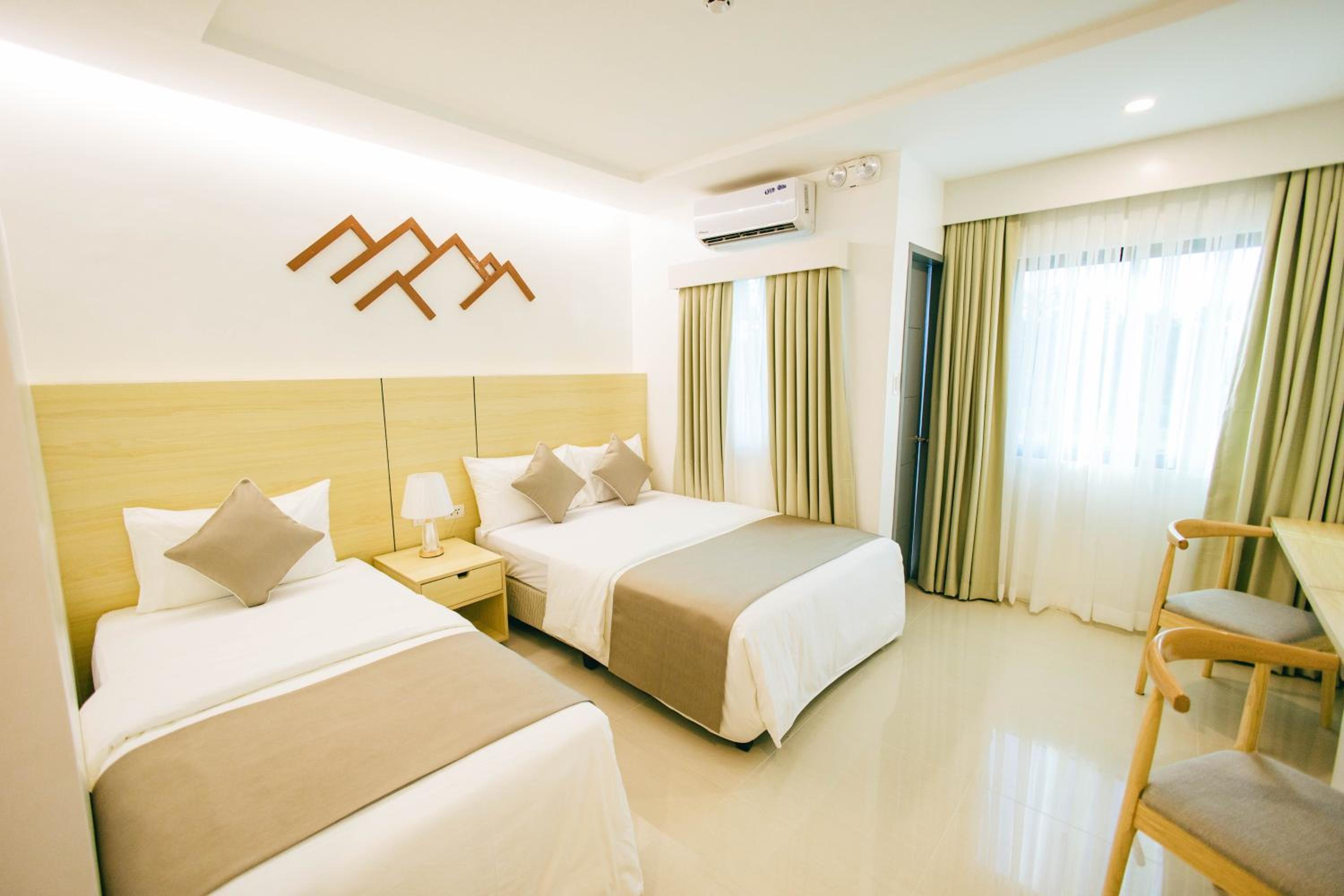 Deluxe Triple Room - Photo 1