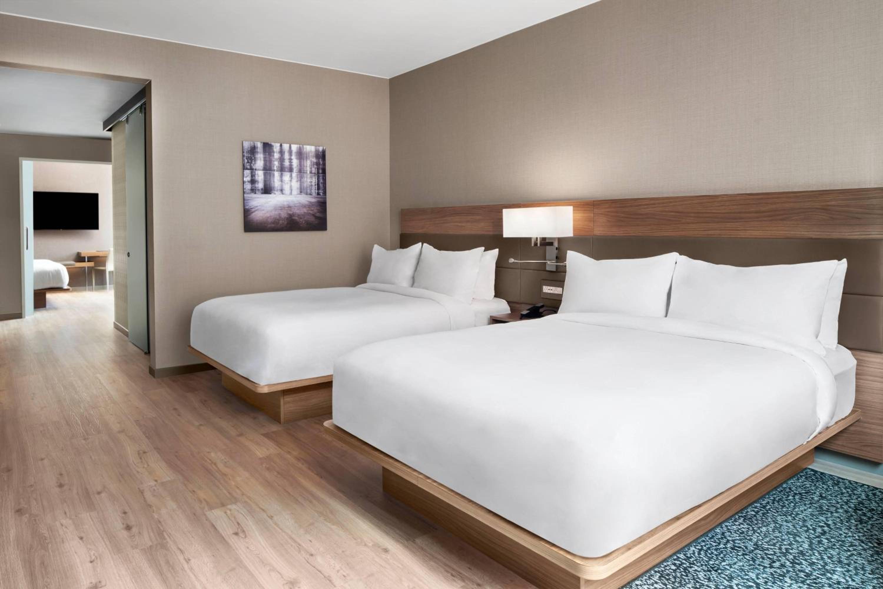 Two-Bedroom Suite with One King Bed and Two Queen Beds - Mobility Access/Hearing Accessible photo 3