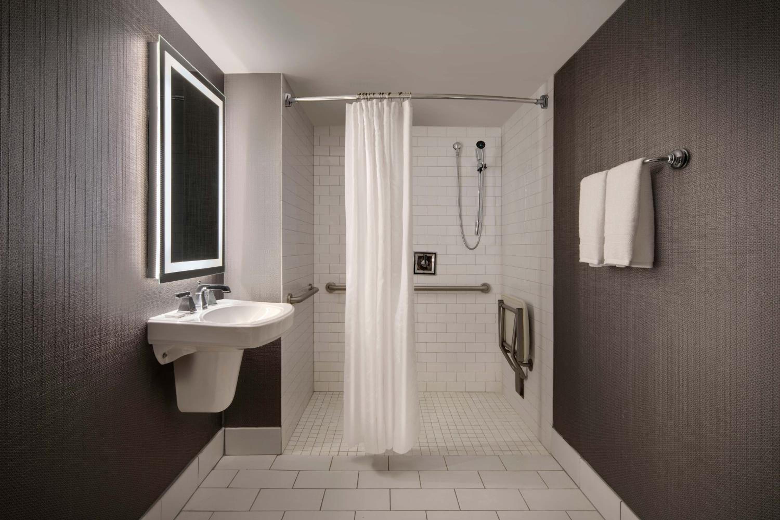King Room with Roll-in Shower - Mobility and Hearing Accessible - Photo 8