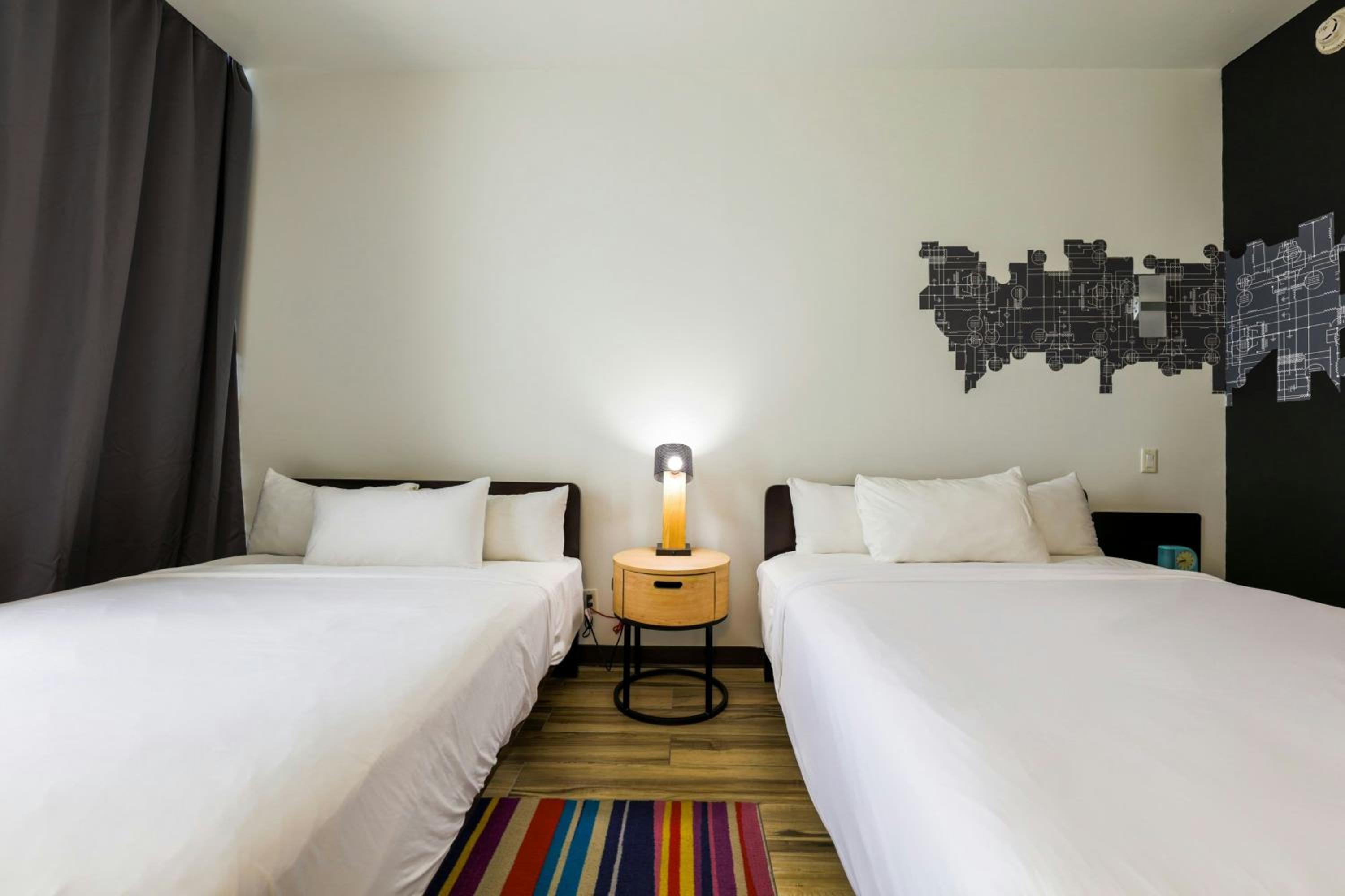 Guest Room with Two Queen Beds and Balcony - Photo 7