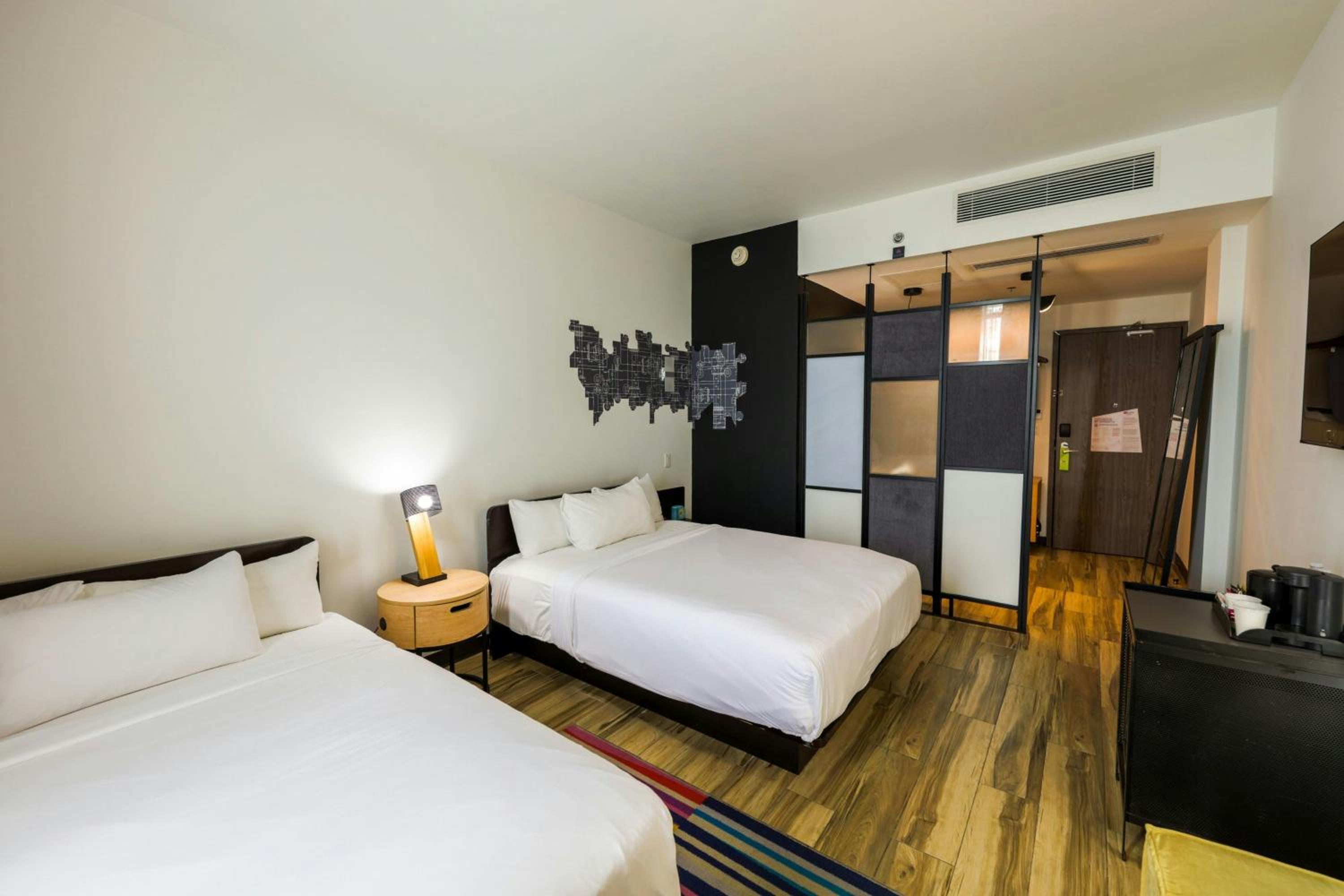 Guest Room with Two Queen Beds and Balcony - Photo 9