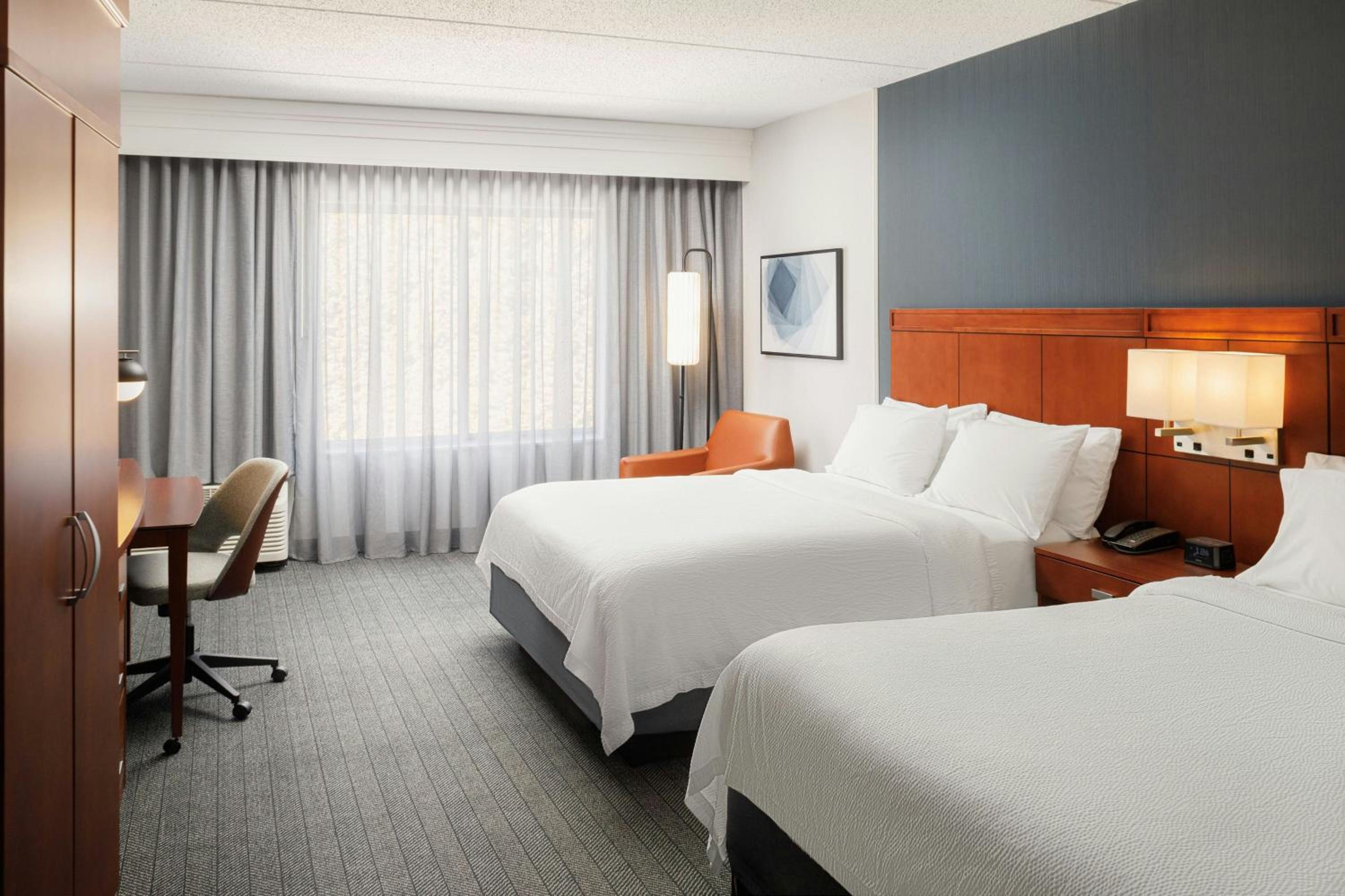 Queen Room with Two Queen Beds and Bathtub - Mobility Access/Hearing Accessible - Photo 1