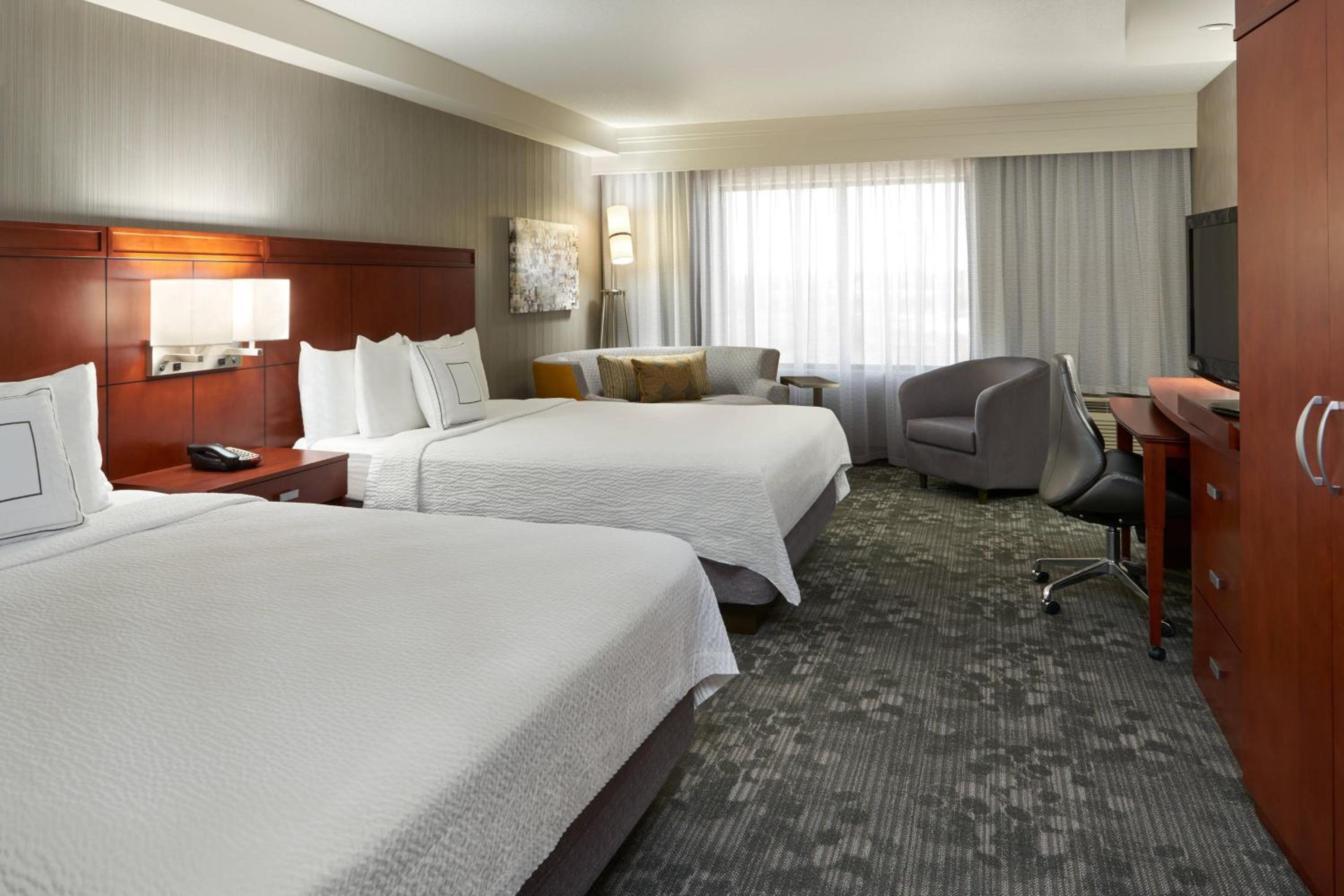 Queen Room with Two Queen Beds and Sofa Bed - Photo 1