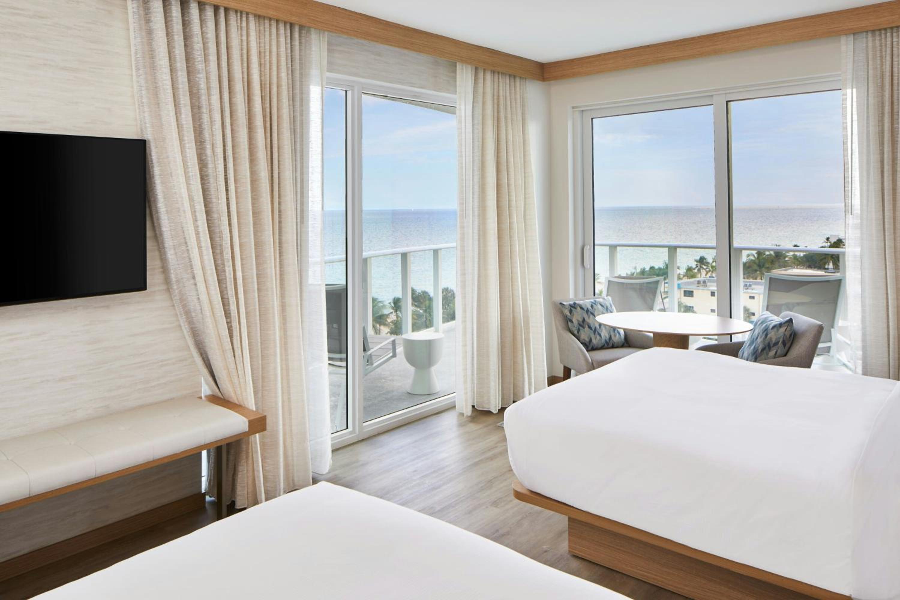 Queen Room with Two Queen Beds, Oceanfront View and Wraparound Balcony - Hearing Accessible - Photo 1