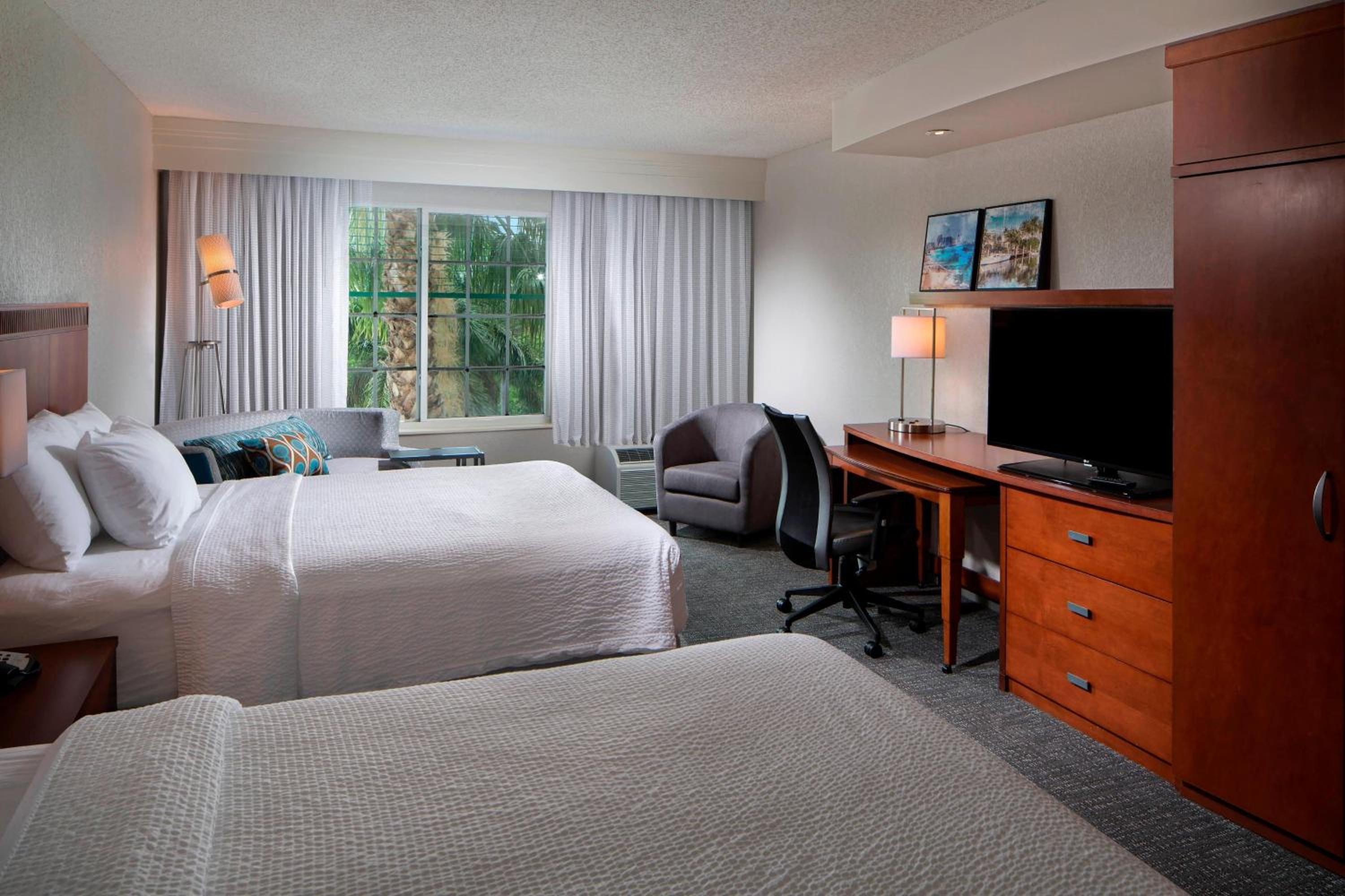 Queen Room with Two Queen Beds - Hearing Accessible - Photo 1