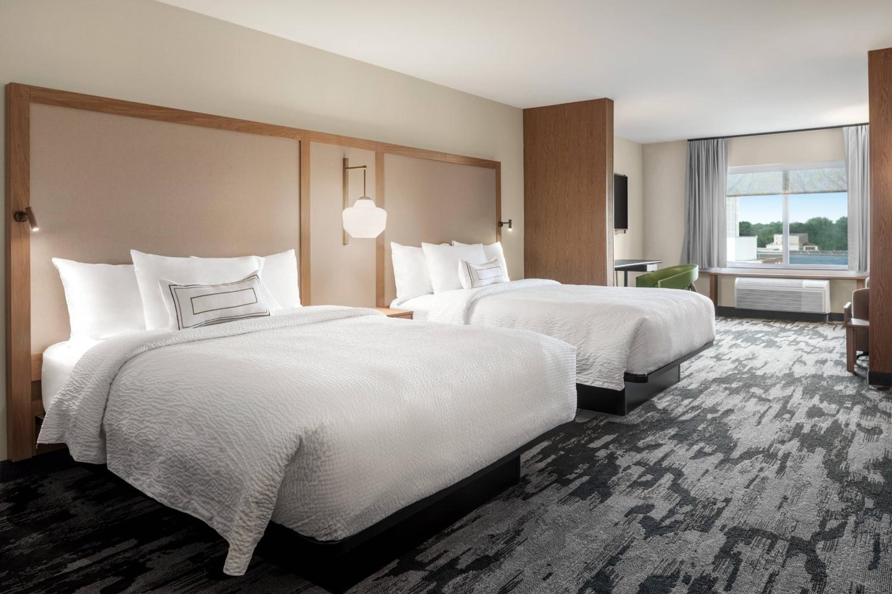 Queen Suite with Two Queen Beds, Sitting Area and Sofa Bed - Photo 1