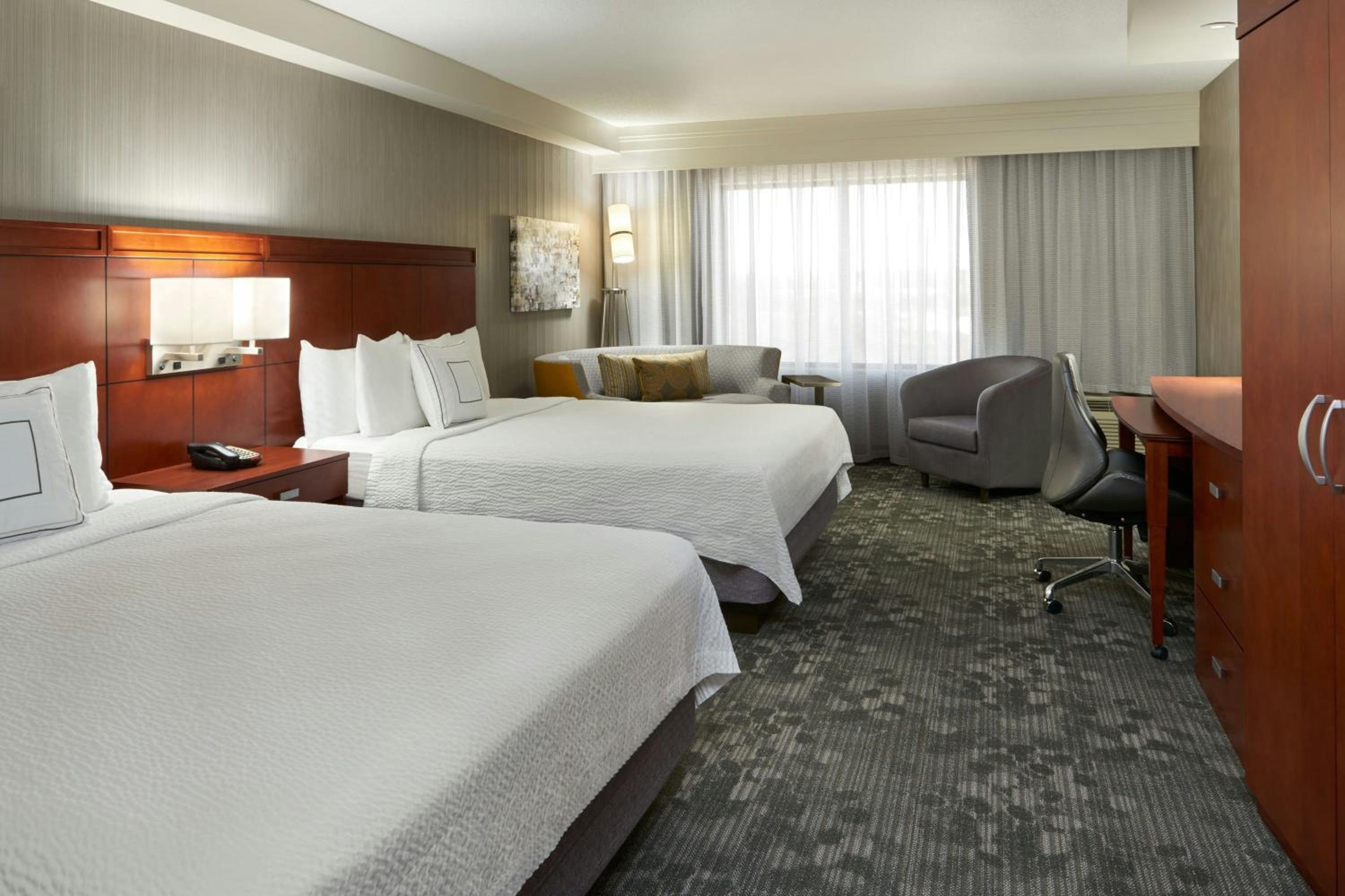 Queen Room with Two Queen Beds and Sofa Bed - Photo 6