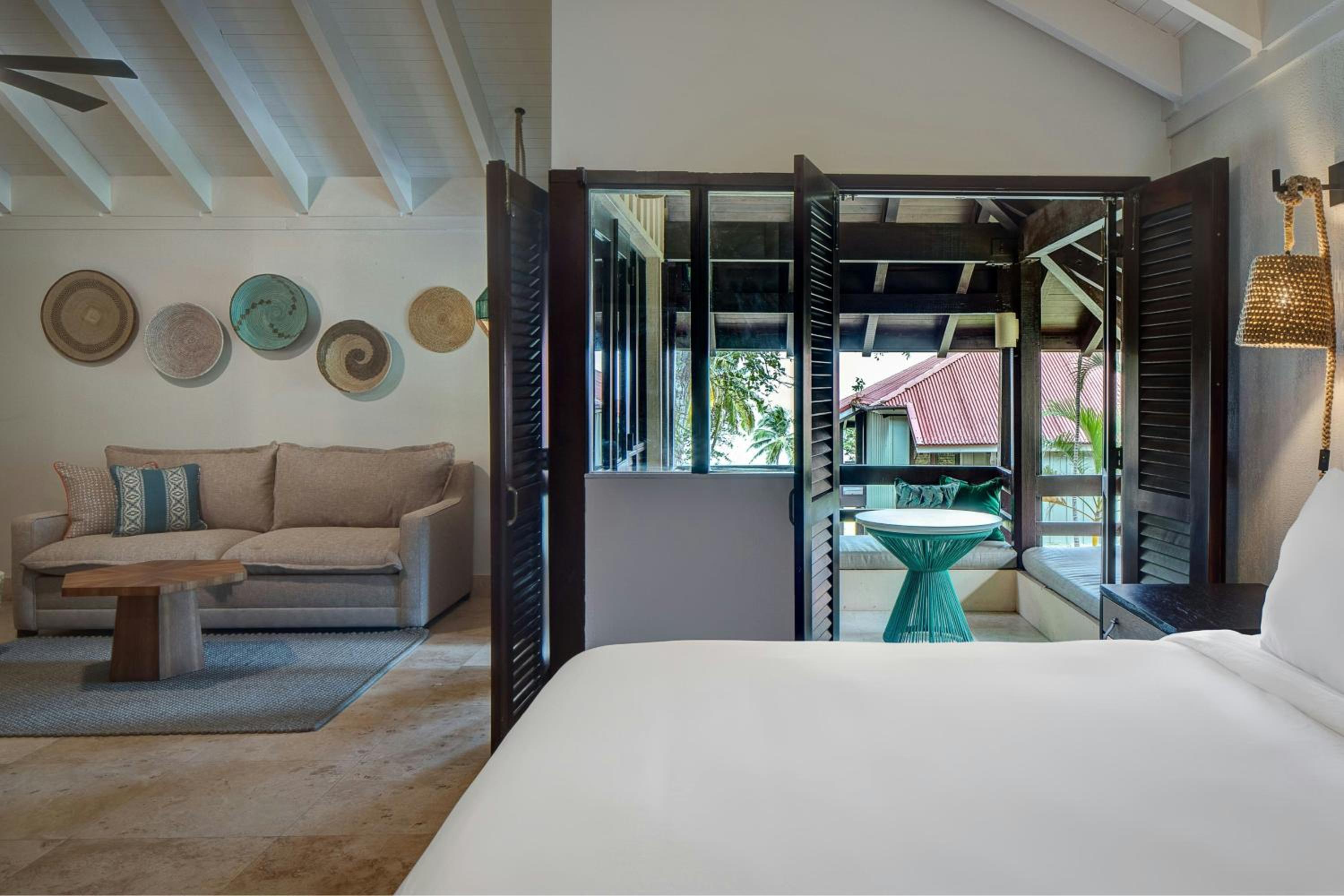 Junior King Suite with Sofa Bed and Partial Ocean View - Mobility Accessible with Roll-In Shower
