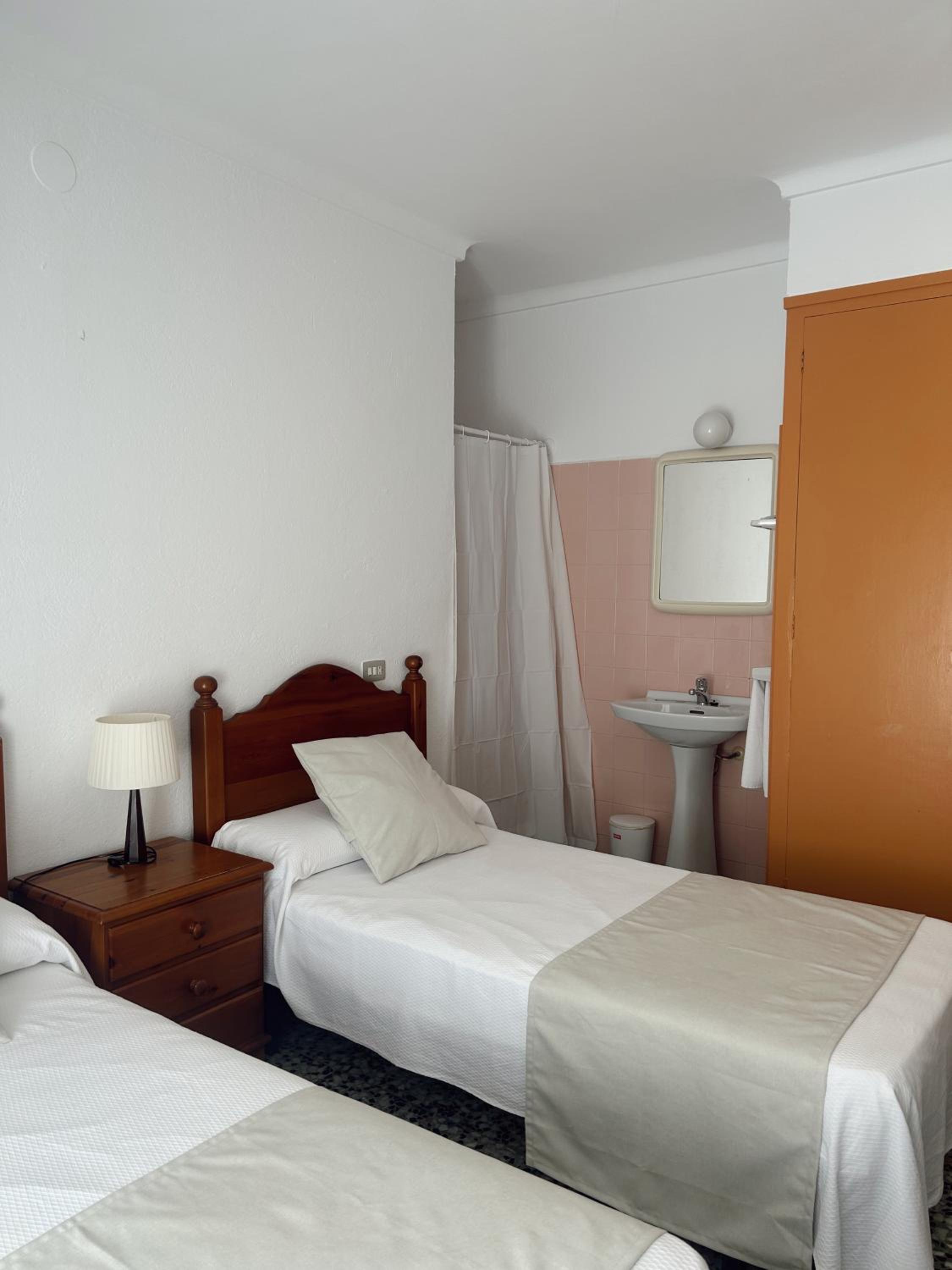 Queen Room with Shared Bathroom