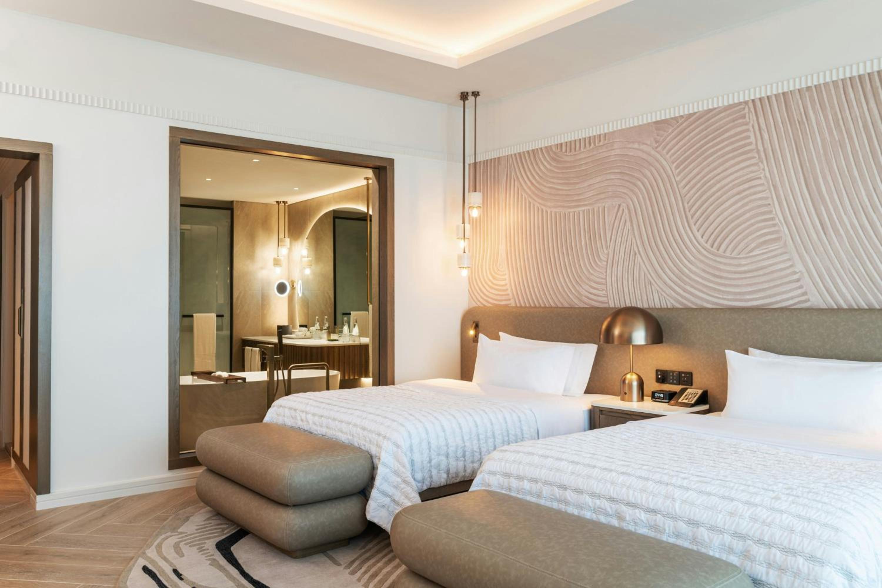 Deluxe Guest Queen Room with Ocean View and Club Lounge Access