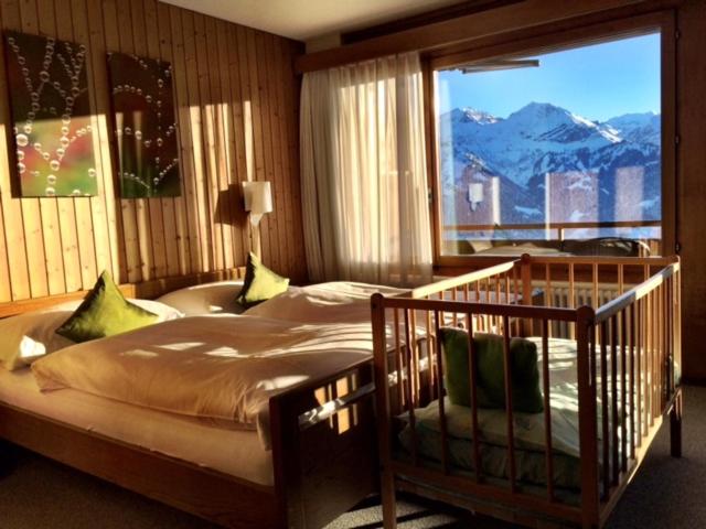 Family Room with Balcony and Lake and Mountain View