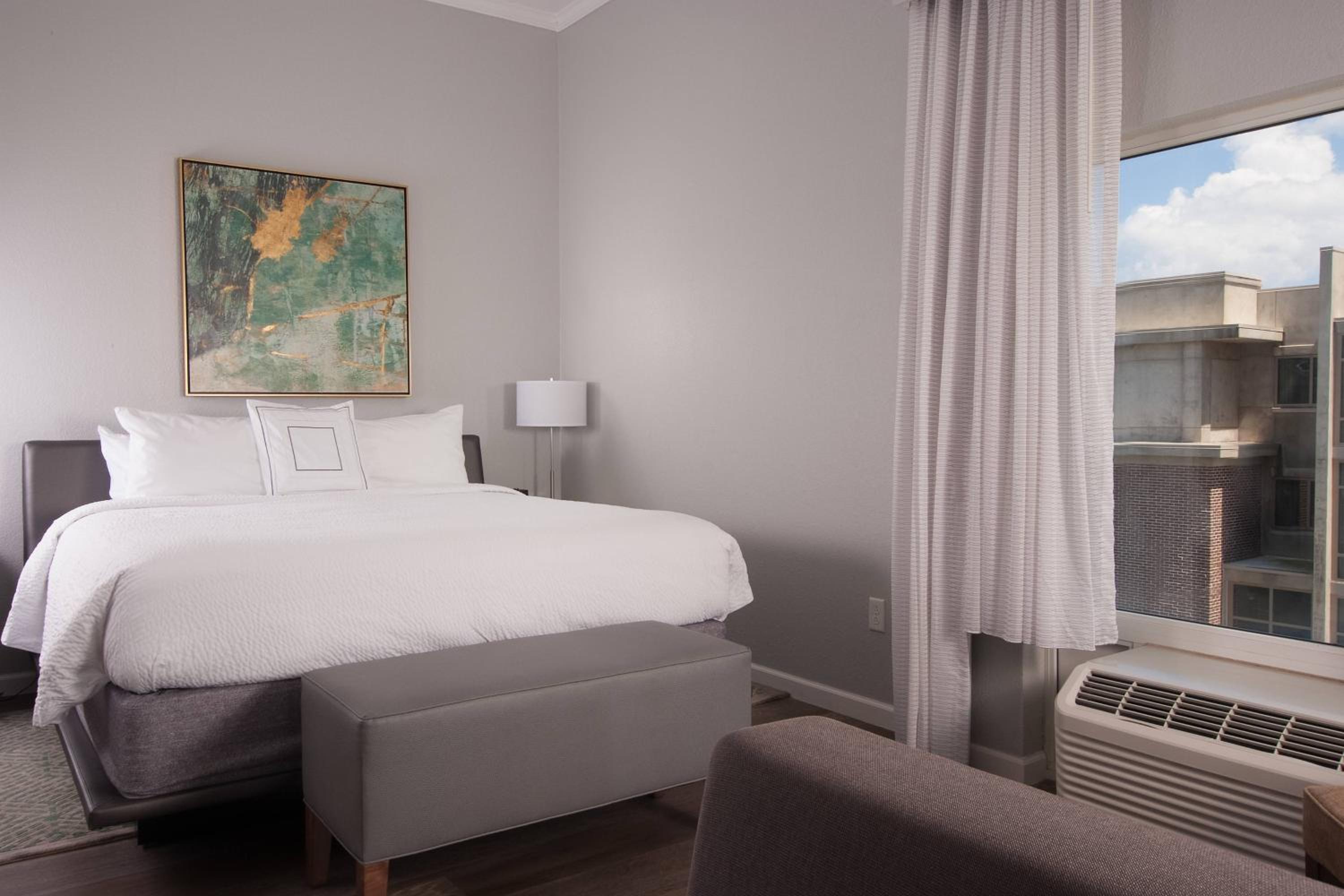 One-Bedroom King Suite with Balcony and Sofa Bed - Communication Assistance