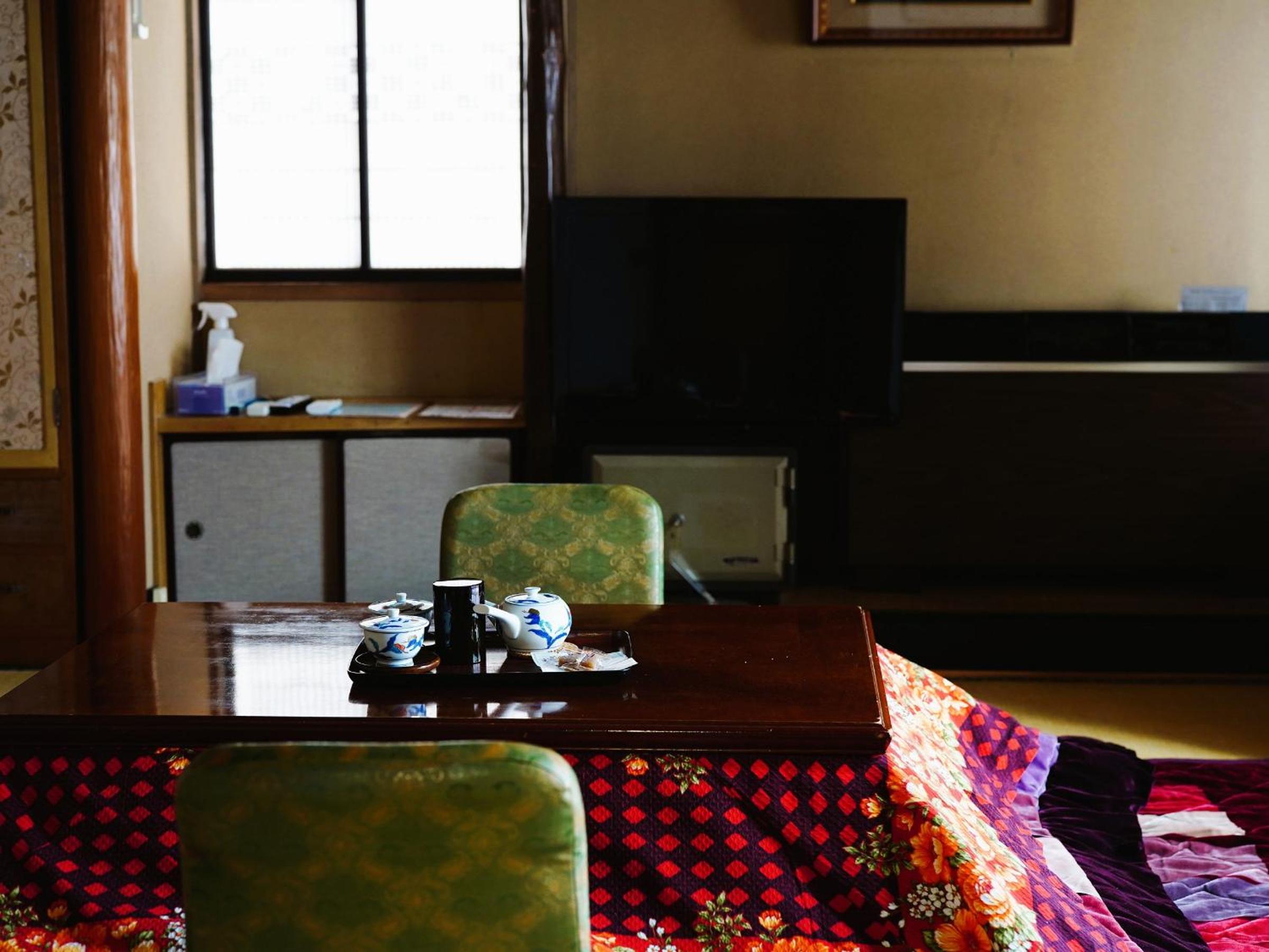 Quadruple Room with Shared Bathroom