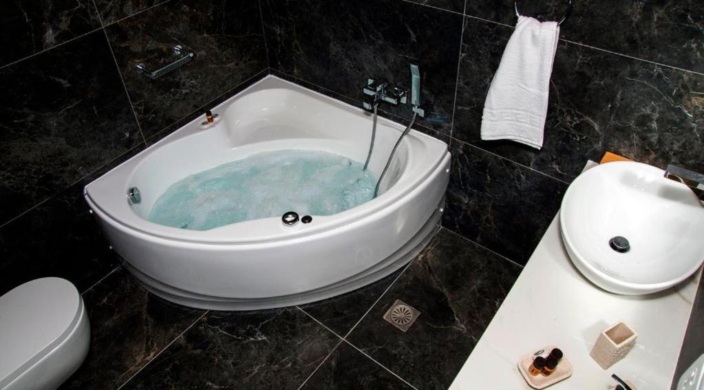 Acropolis Corner Suite with Balcony and Jetted tub