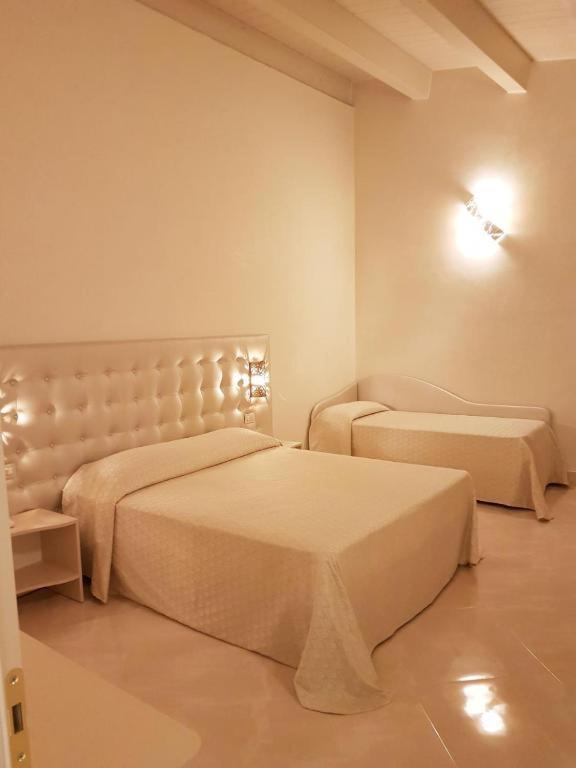 Deluxe Triple Room - Photo 1