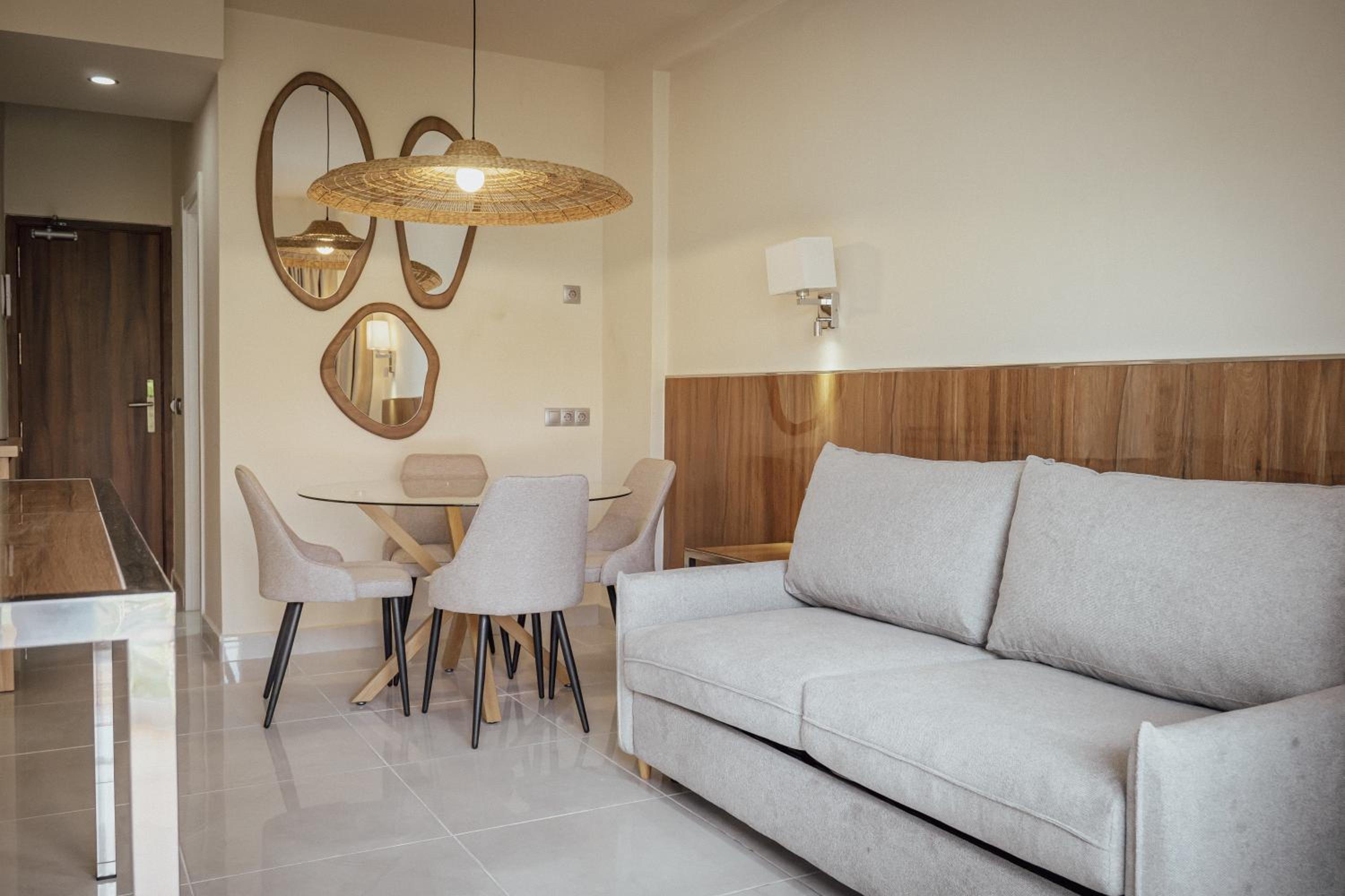 One-Bedroom Apartment with Balcony and City View