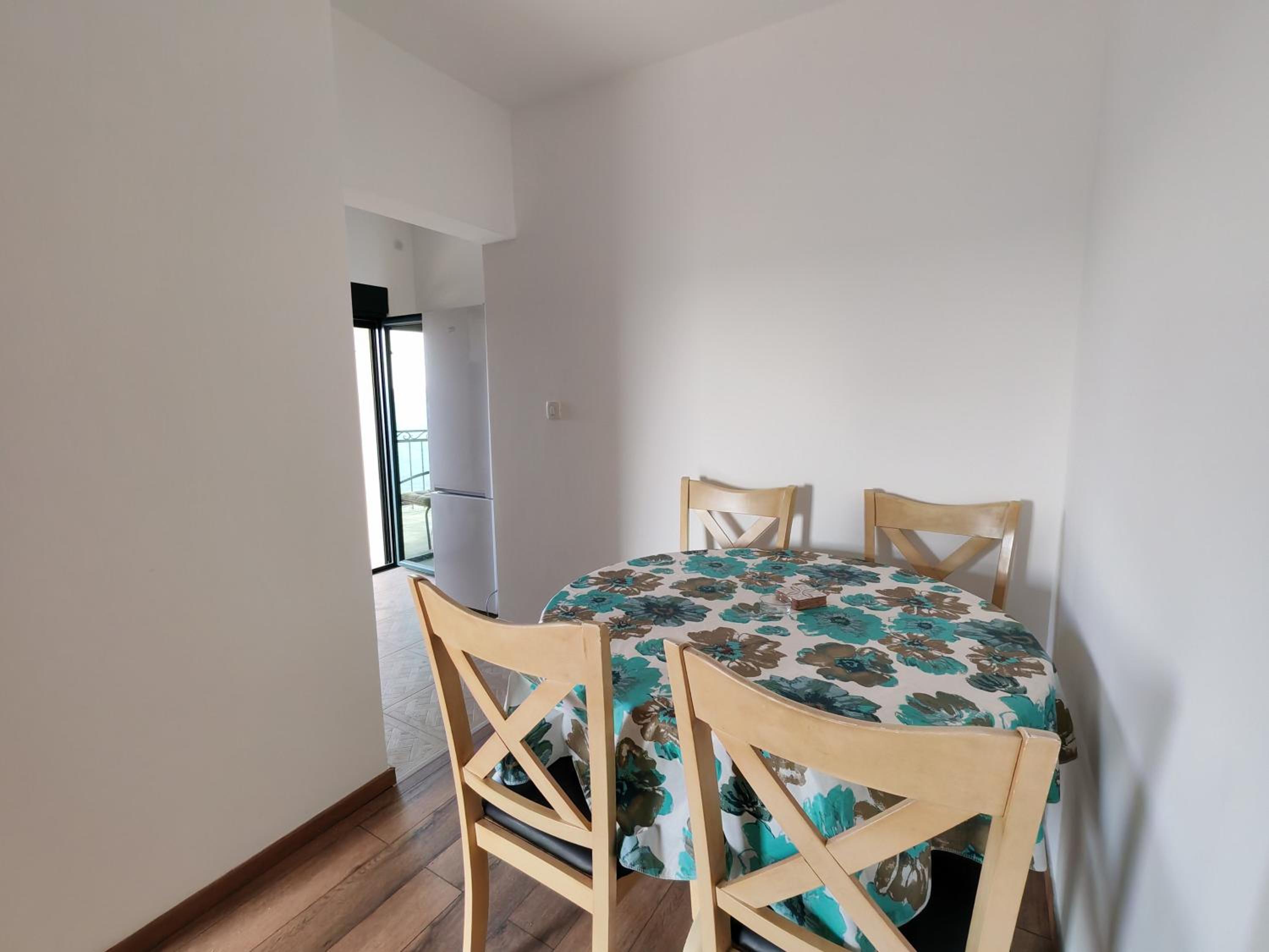 One-Bedroom Apartment with Balcony and Sea View