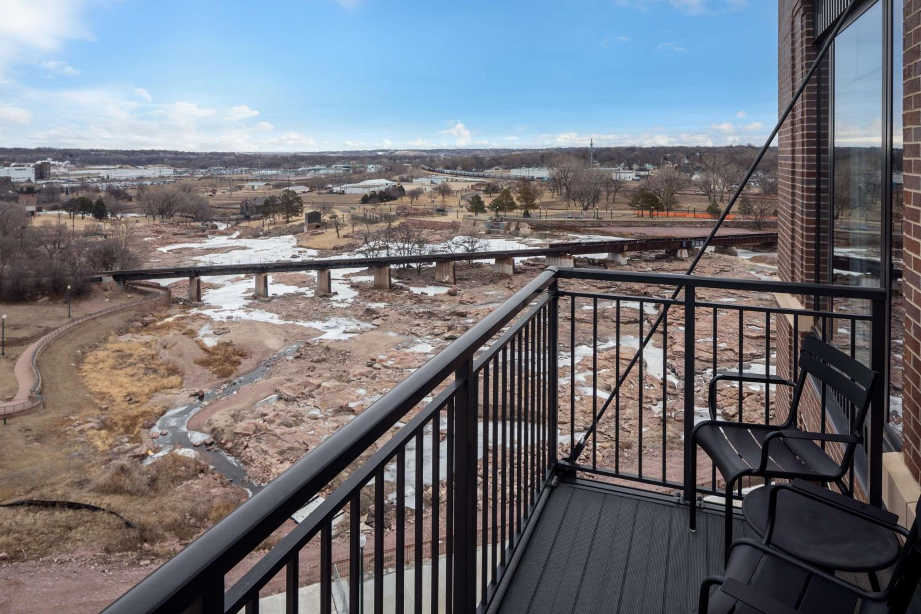 Corner King Room with Sofa Bed and Balcony - Falls Park View - Photo 1