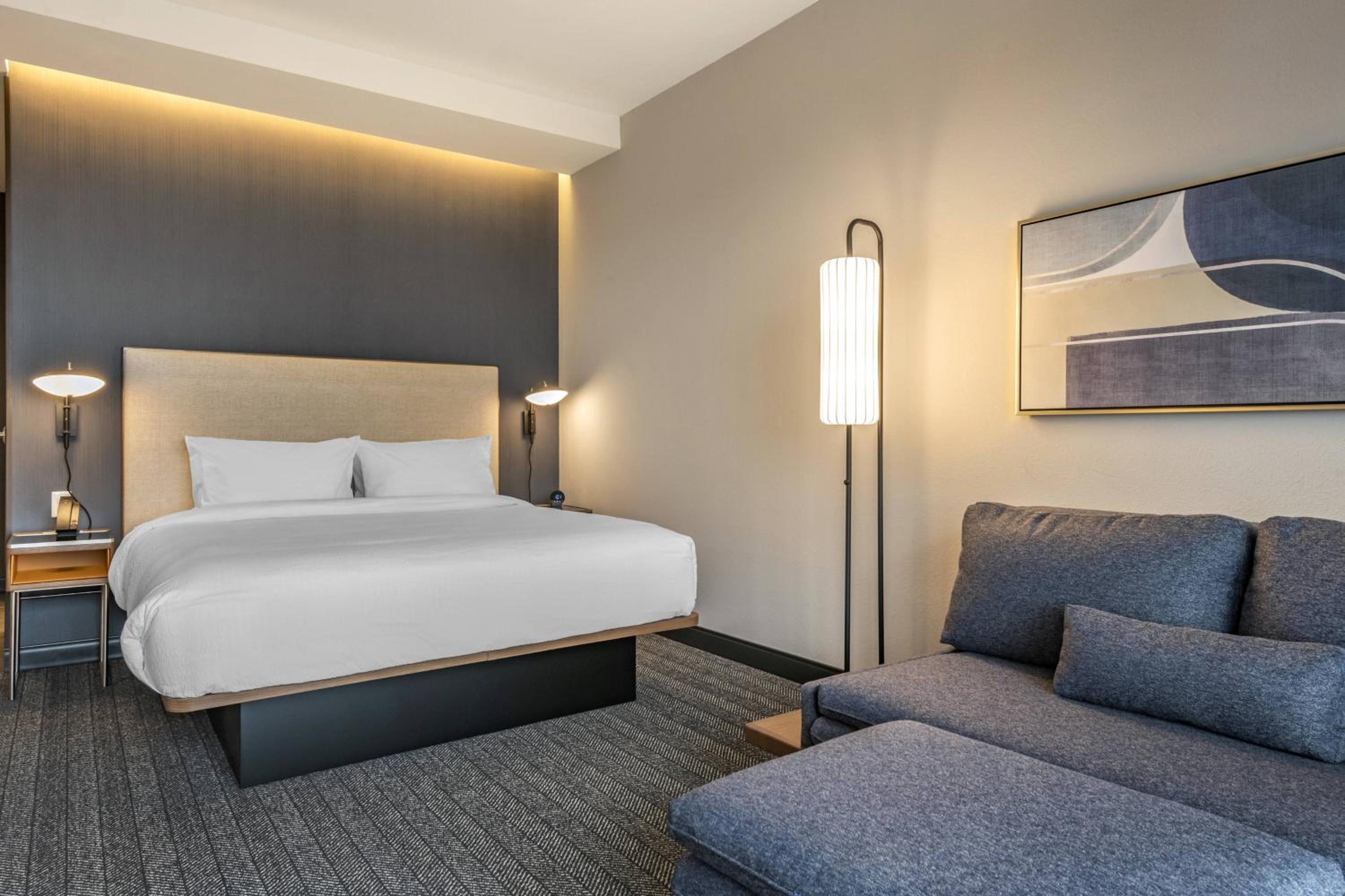 King Room with Sofa Bed and Balcony - Hearing Accessible - Photo 1